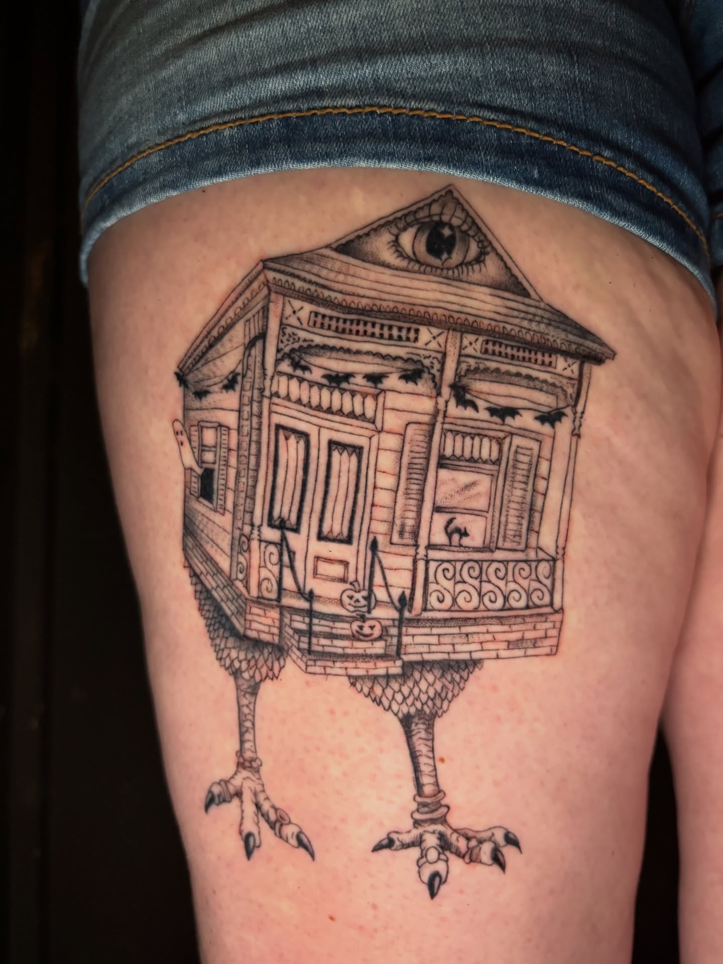 Haunted house realism tattoo on the thigh by Jojo Rose ✨ Denver Tattoo Artist