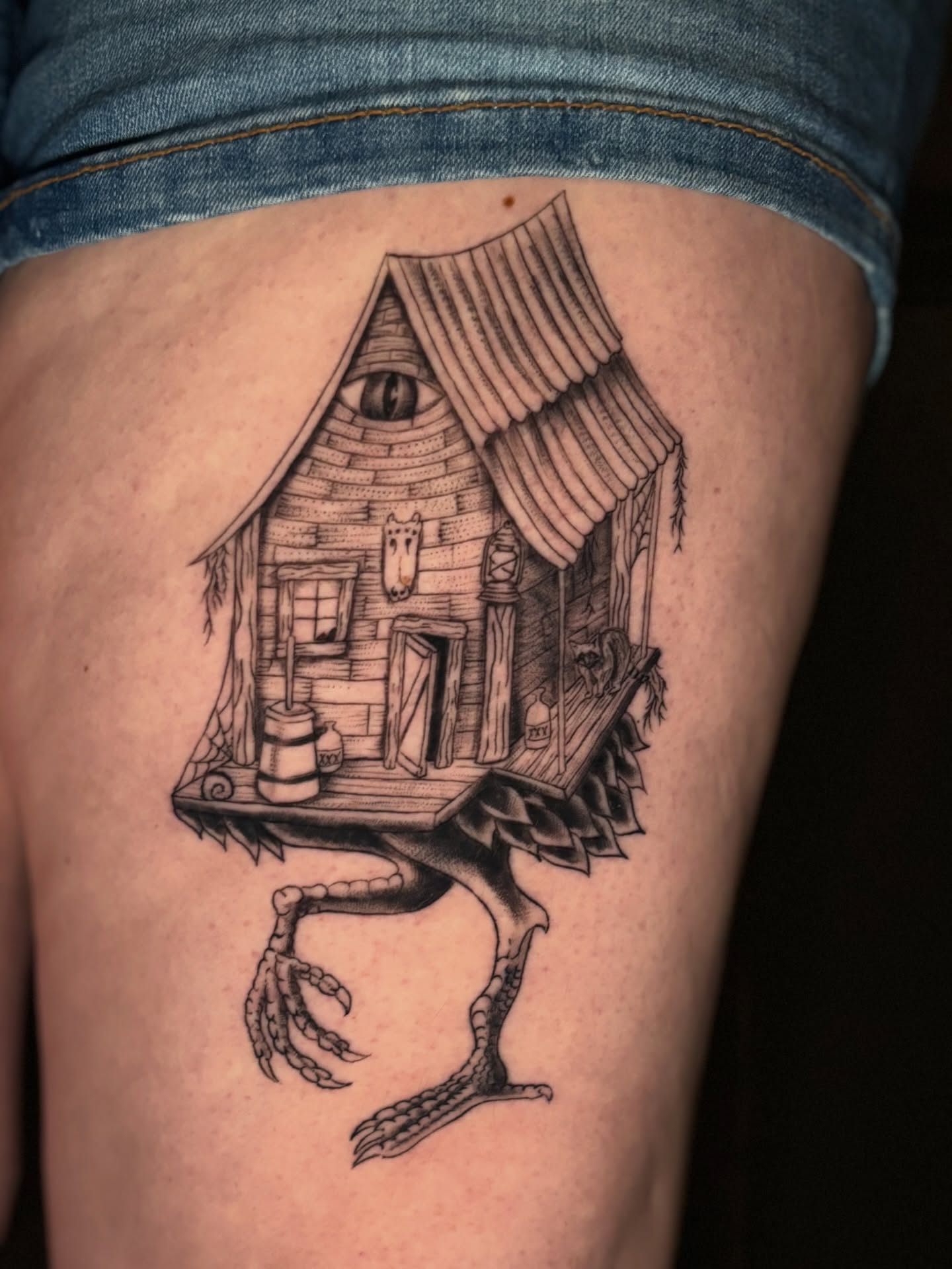 House on legs surrealism tattoo on the thigh by Jojo Rose ✨ Denver Tattoo Artist