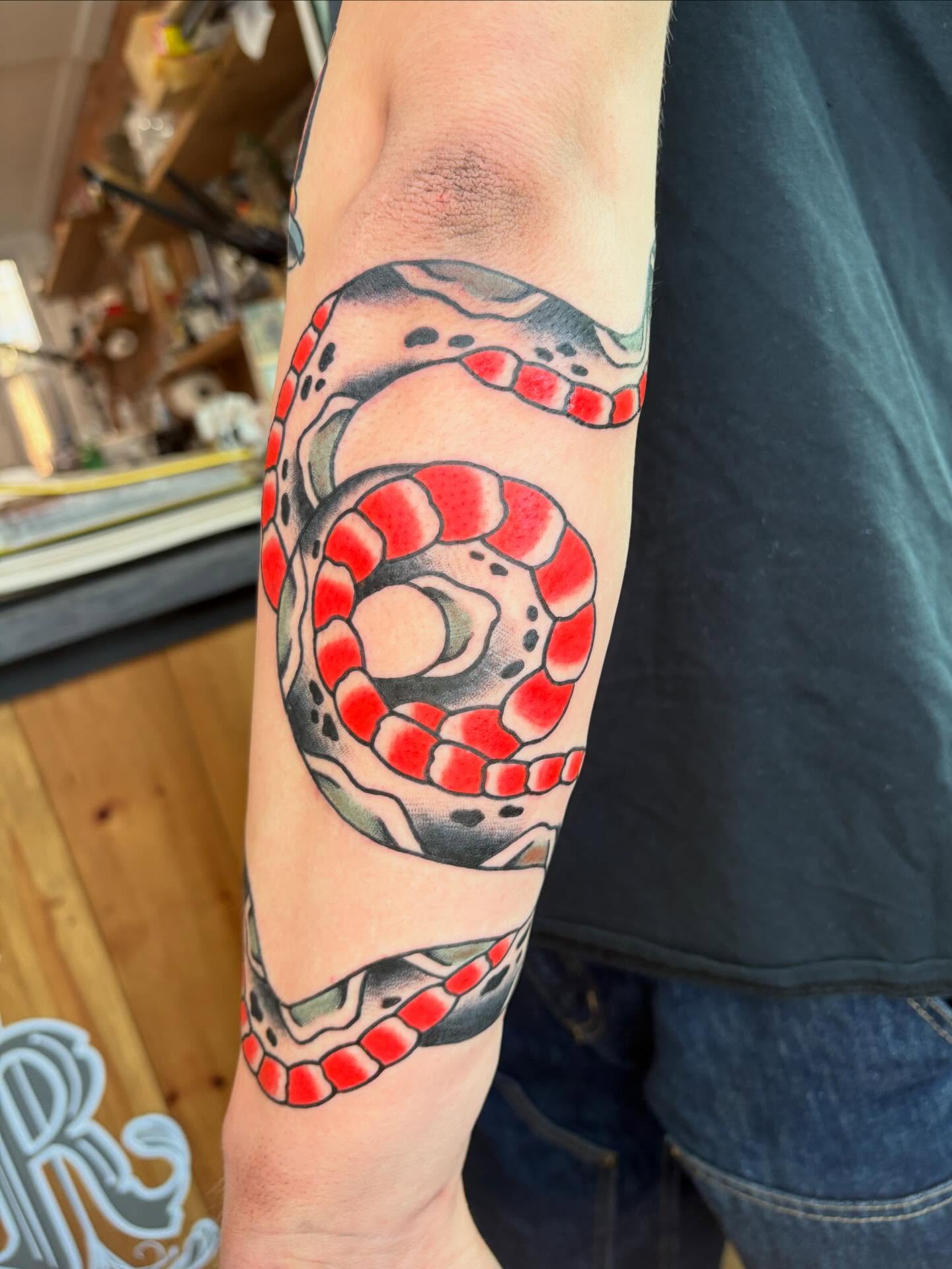 Snake American traditional tattoo on the forearm by Evan Bisso, Philadelphia, Pennsylvania