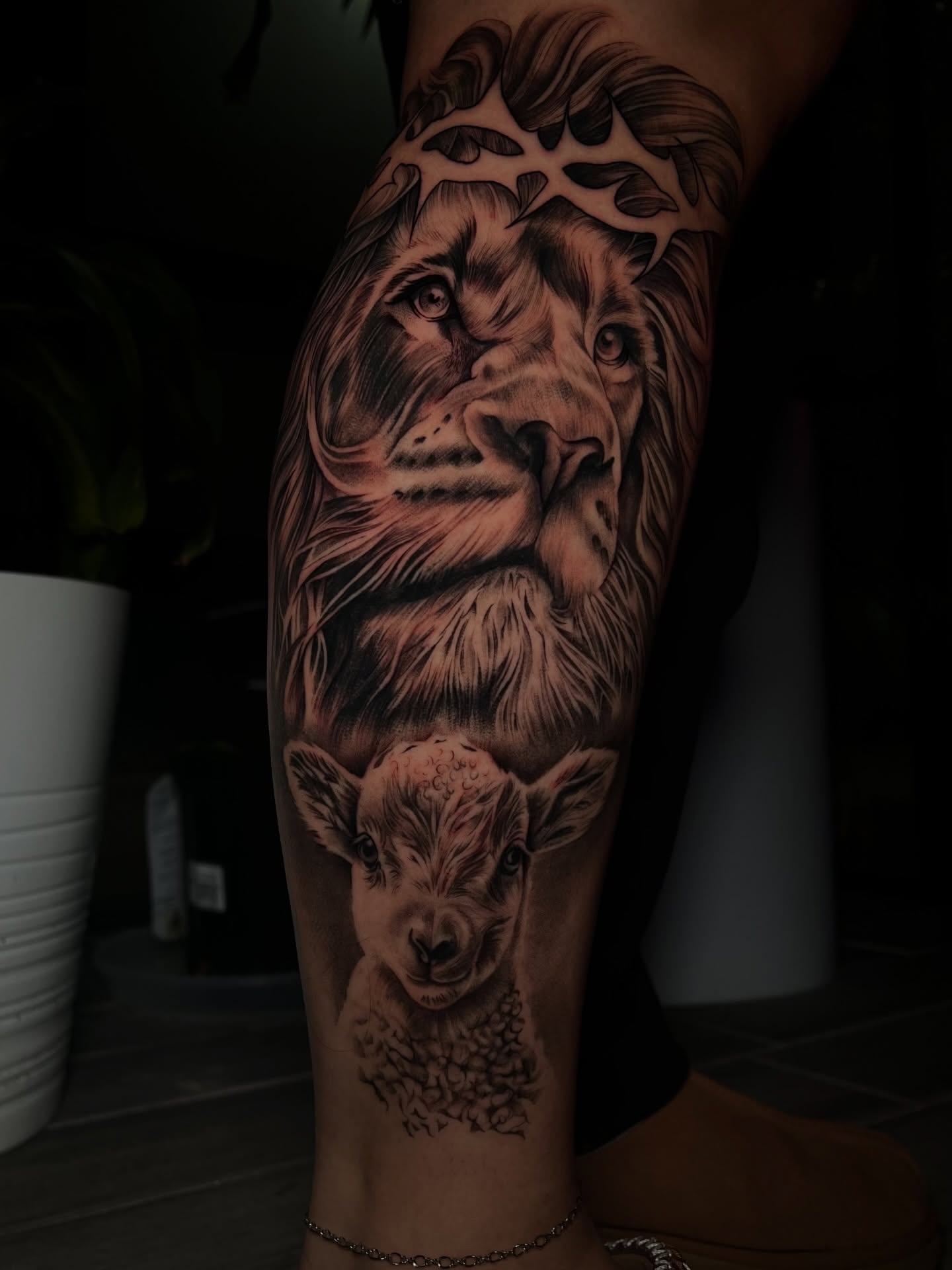 Lion and lamb realism tattoo on the forearm by Espi