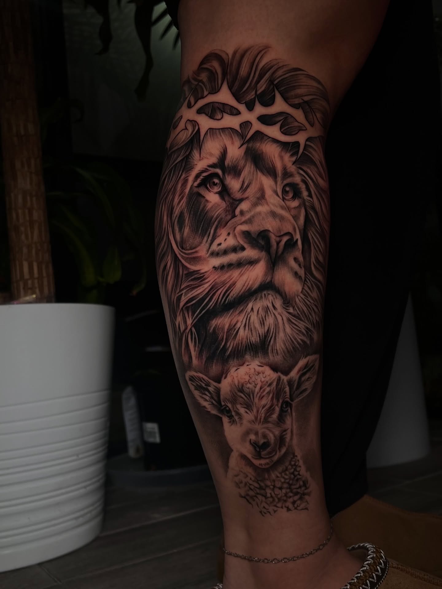 Lion and lamb realism tattoo on the forearm by Espi
