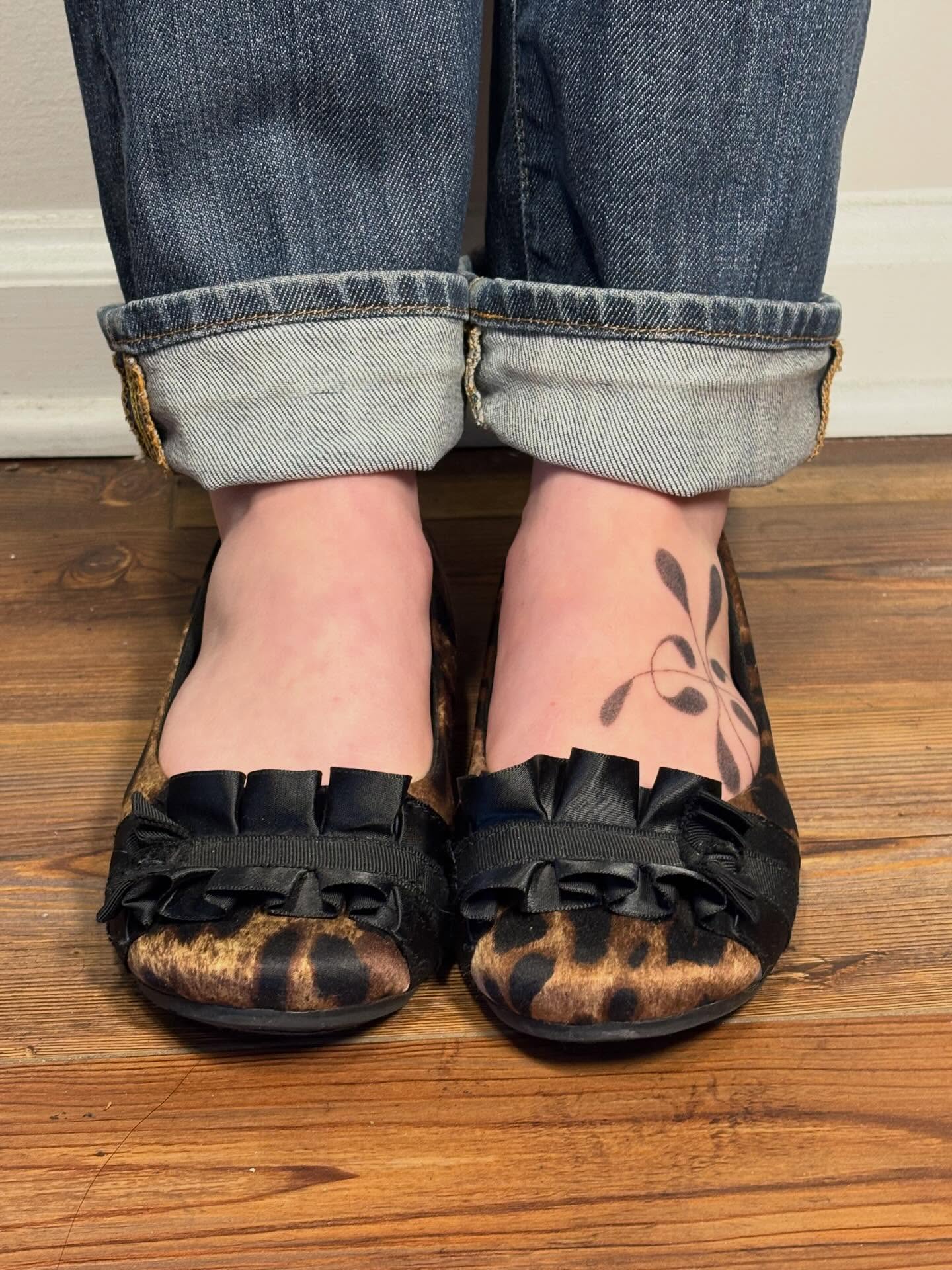 Abstract floral black and grey tattoo on the foot by Jill