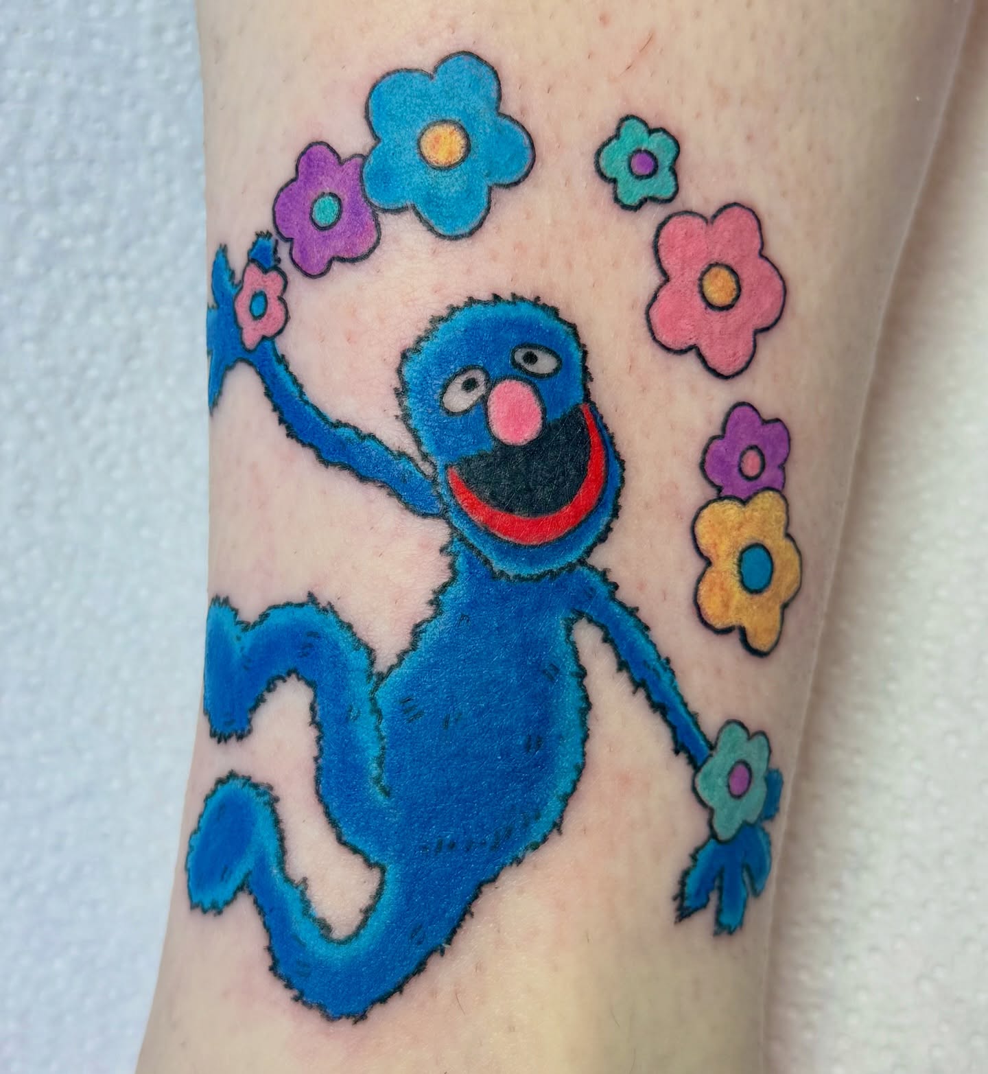 Grover illustrative tattoo on the forearm by Bronzino Ink - Karen, Asheville, North Carolina