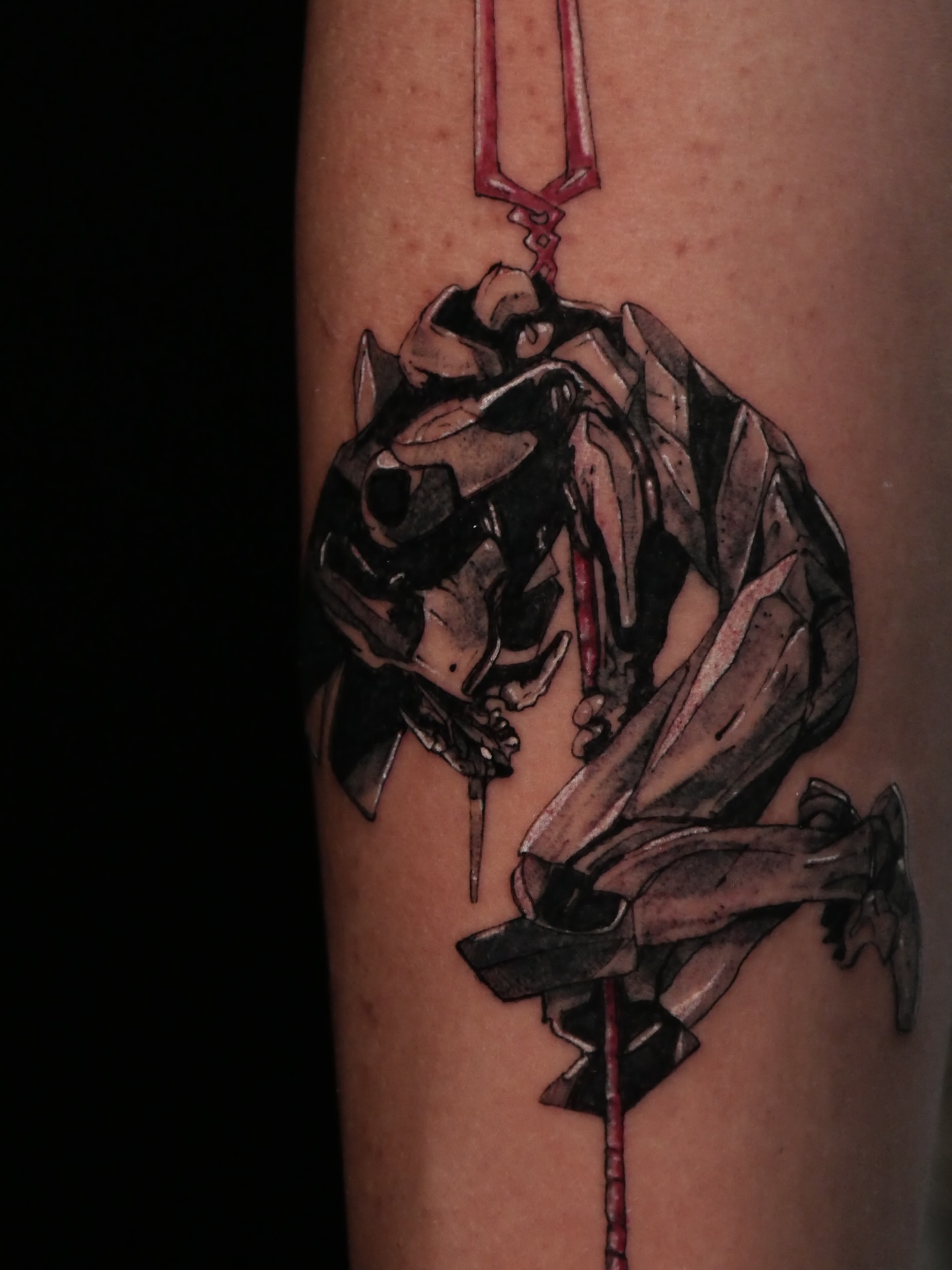 Mecha anime tattoo on the forearm by Sloppy