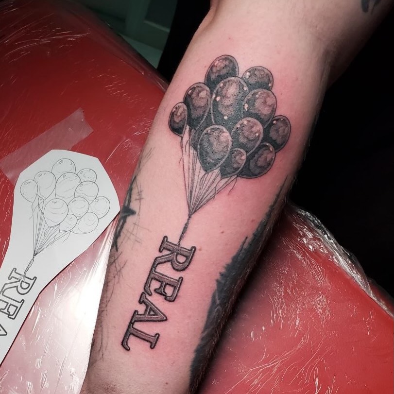 Balloons black and grey tattoo on the forearm by Matthew Ray, Harrisburg, North Carolina