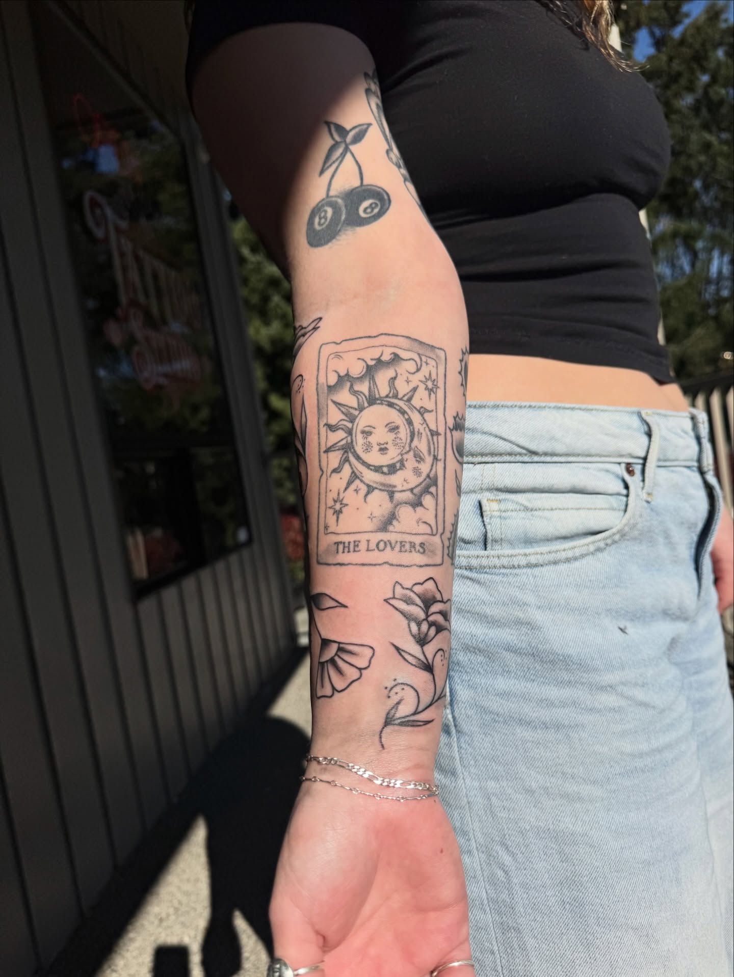 The lovers tarot card black and grey tattoo on the forearm by juice🕷tattoo artist