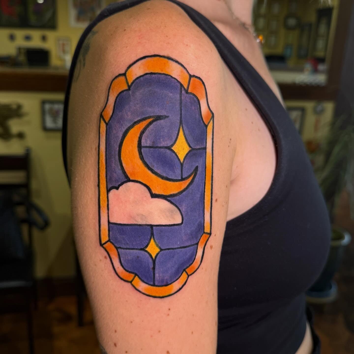 Stained glass window geometric tattoo on the shoulder by Erin McDavis