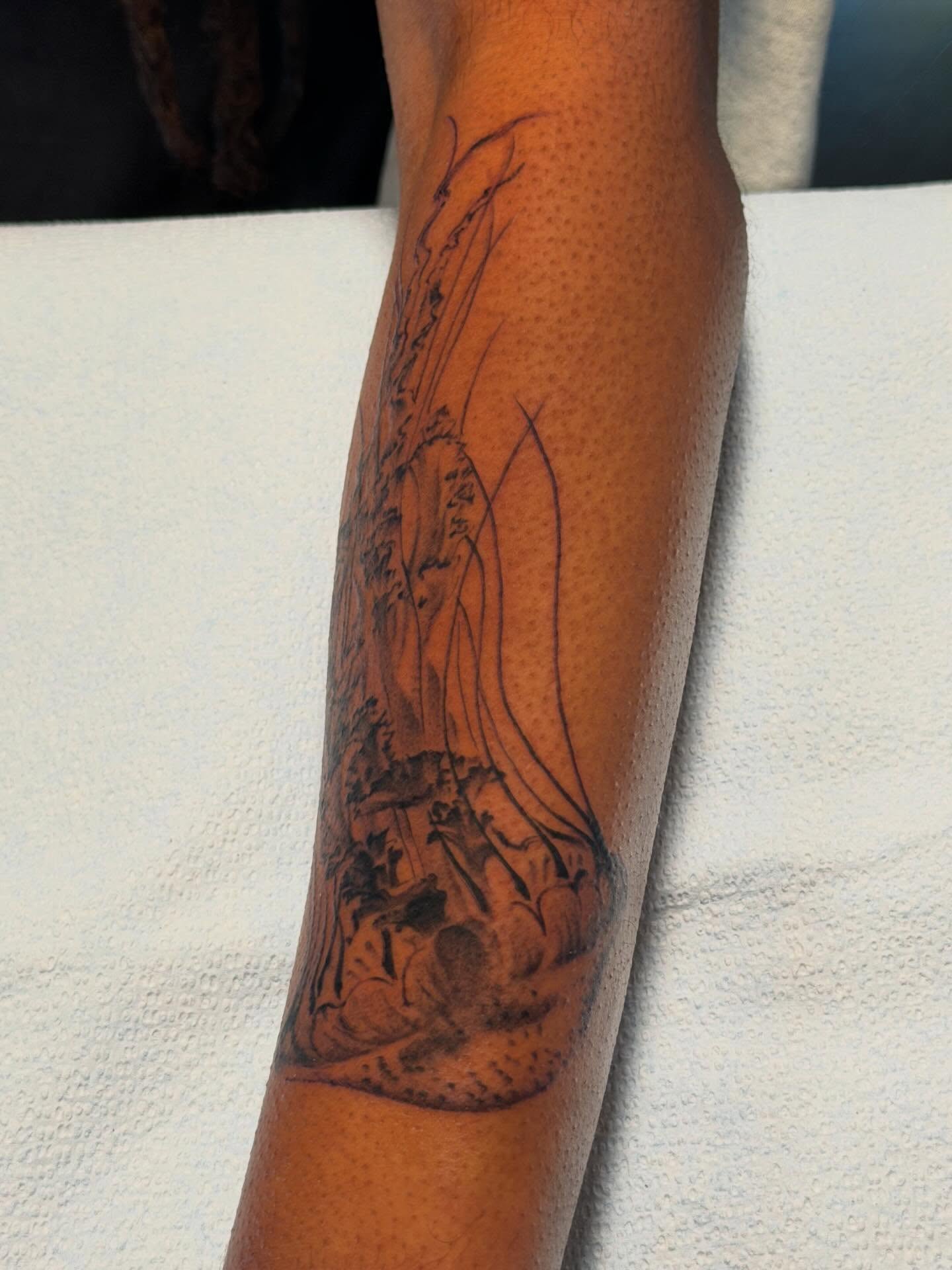 Ship sailing black and grey tattoo on the forearm by James Nelson