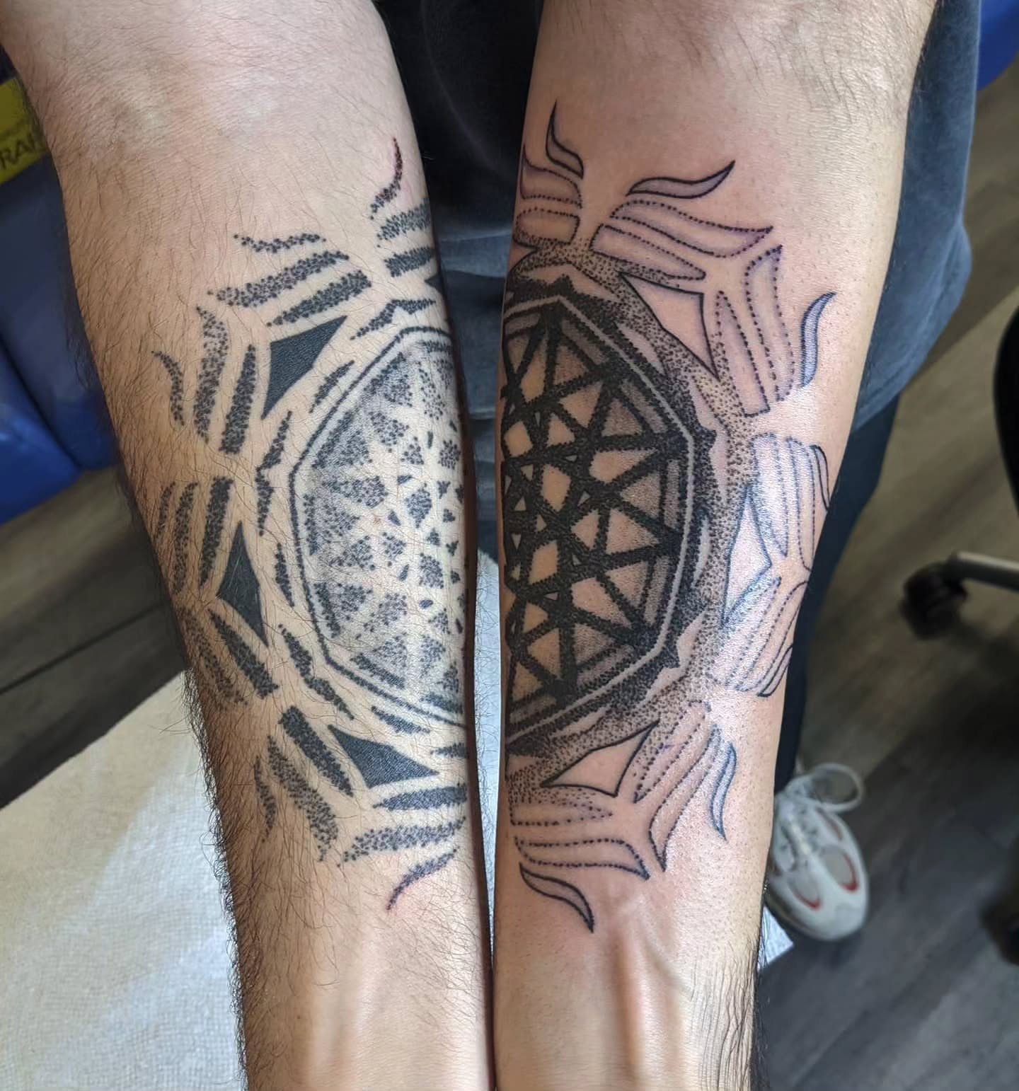 Geometric design dotwork tattoo on the forearm by Ed Gonzalez