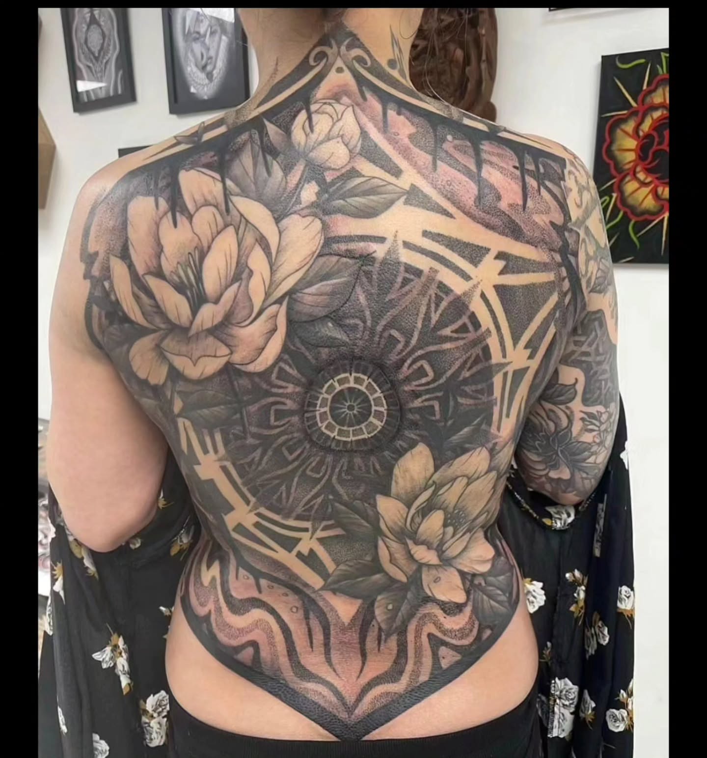 Floral mandala geometric tattoo on the back by Ed Gonzalez