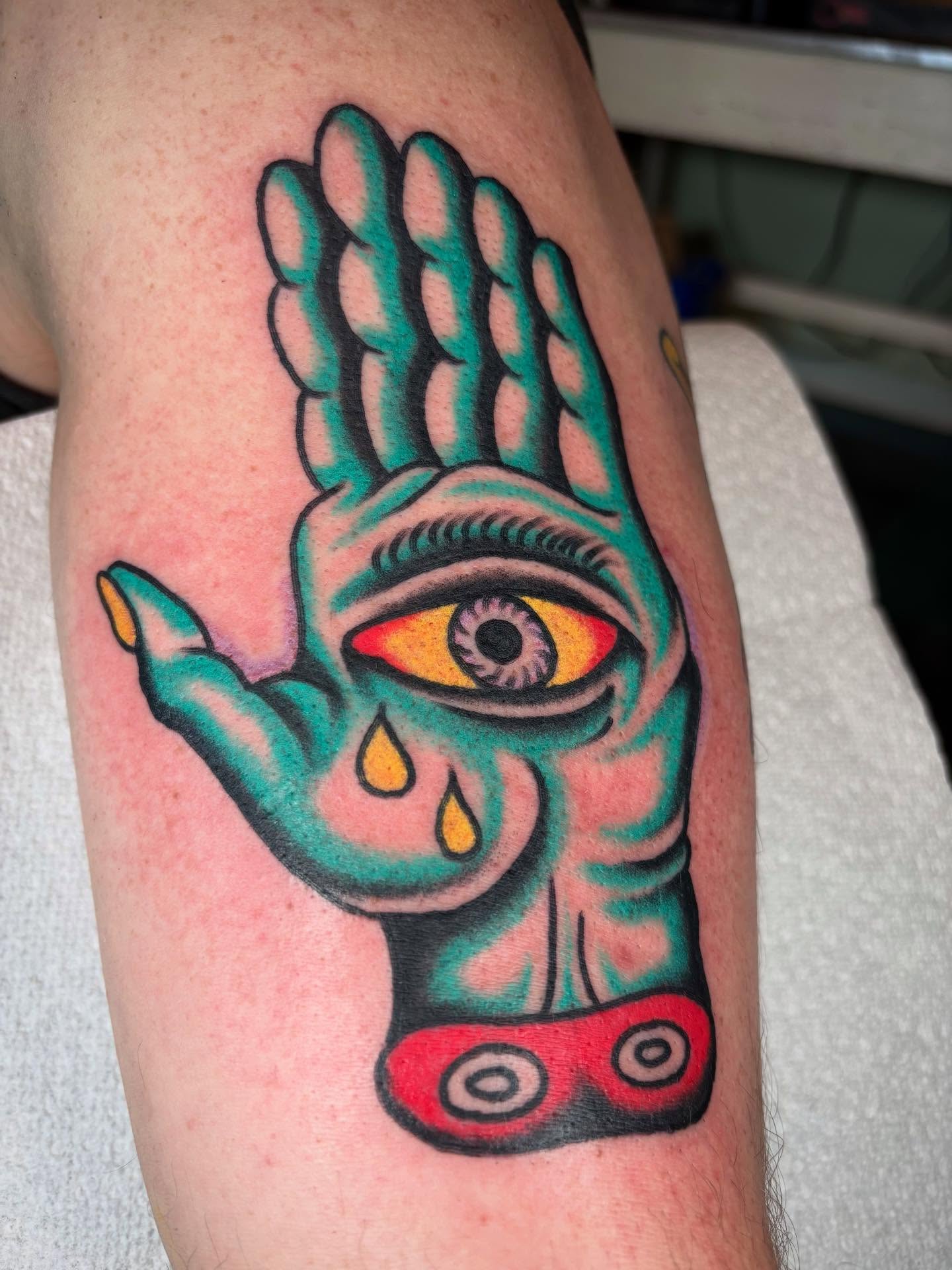 Hand with eye American traditional tattoo on the forearm by 🌹