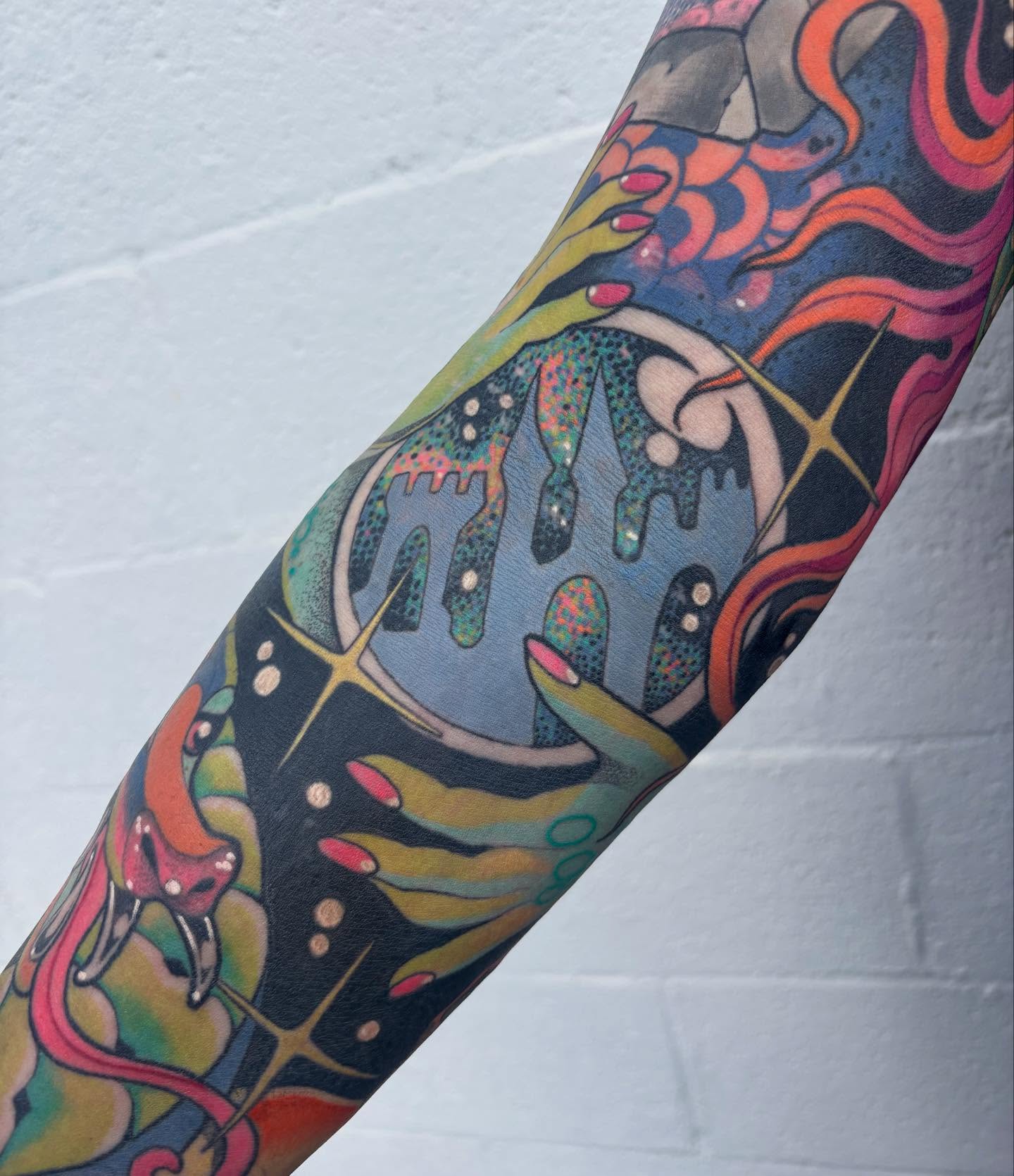 Abstract hands dotwork tattoo on the forearm by Carly Zehring