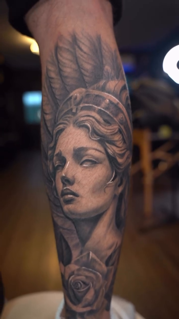 Grecian bust and rose realism tattoo by Cristian Rodriguez