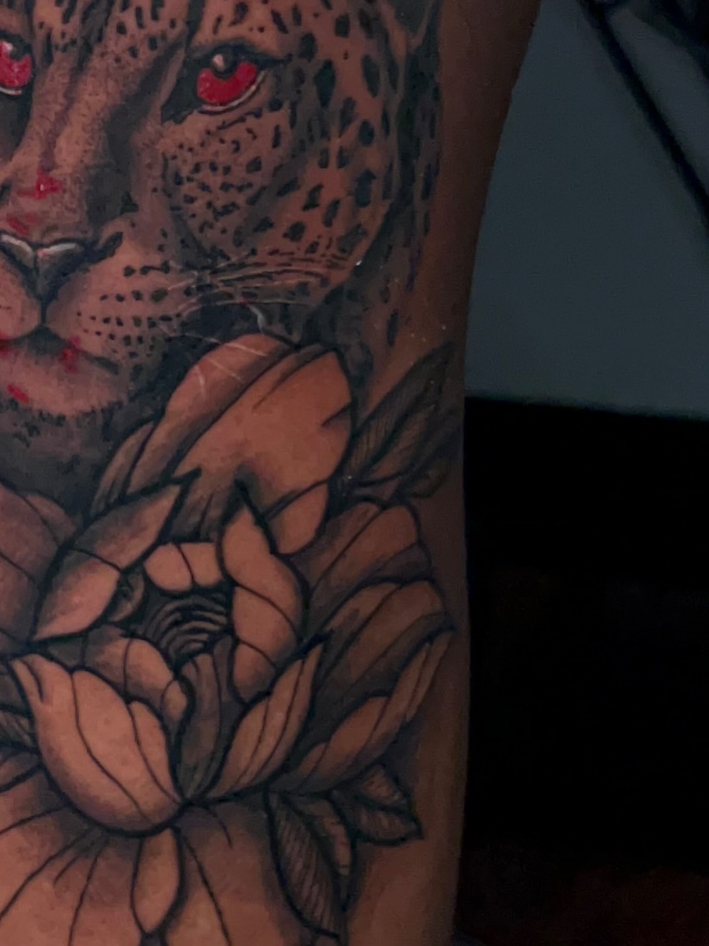 Leopard and lotus realism tattoo on the forearm by Unknwn Ink ⭐️