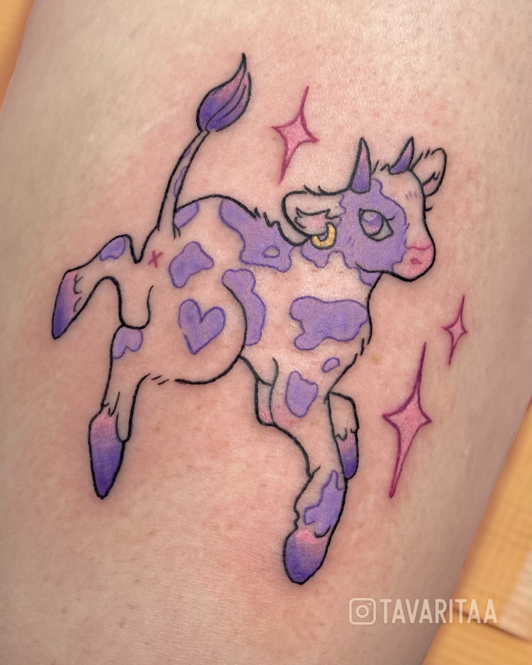 Cow illustrative tattoo on the thigh by Tavarita