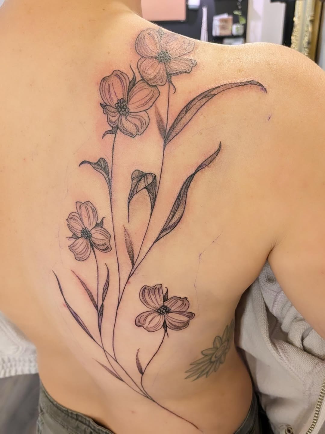 Tattoo by @leah.g.tattoos — fine_line, black_and_grey