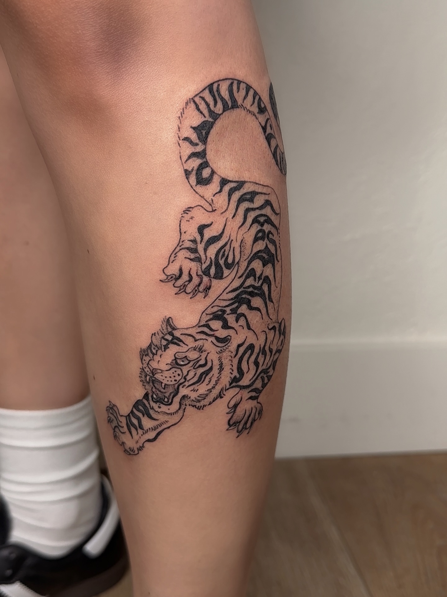 Tiger and sun black and grey tattoo on the thigh by ❤️‍🔥 Abigail Chambers ❤️‍🔥