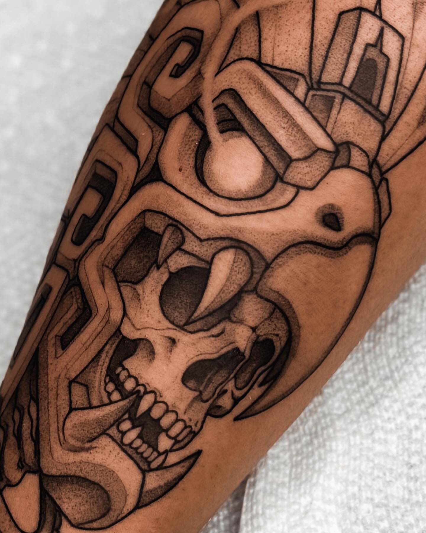 Skull geometric tattoo on the forearm by 𝔍𝔞𝔯𝔢𝔡 𝔞𝔩𝔩𝔢𝔫