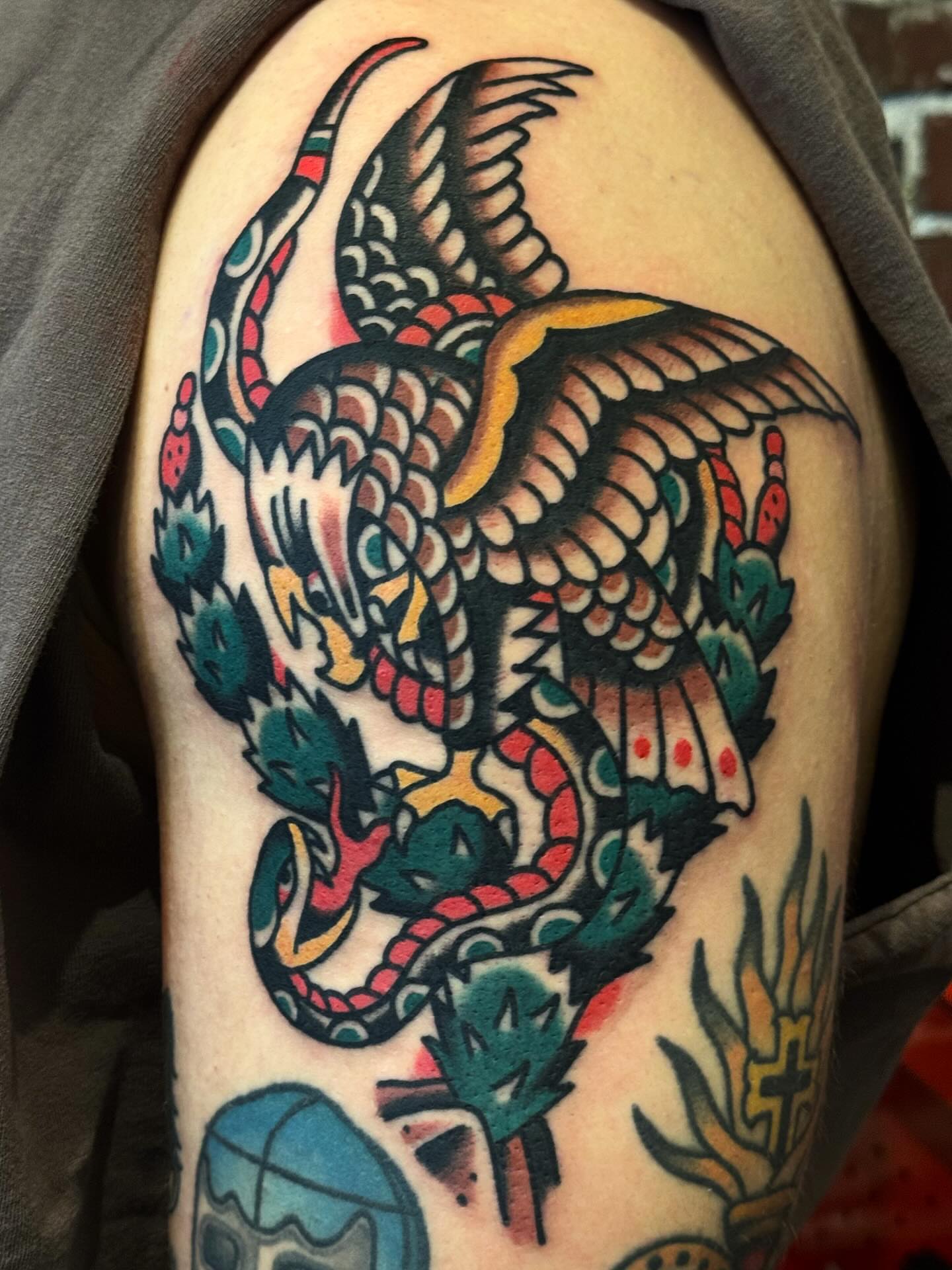 Dragon American traditional tattoo on the thigh by Bryce Shearer