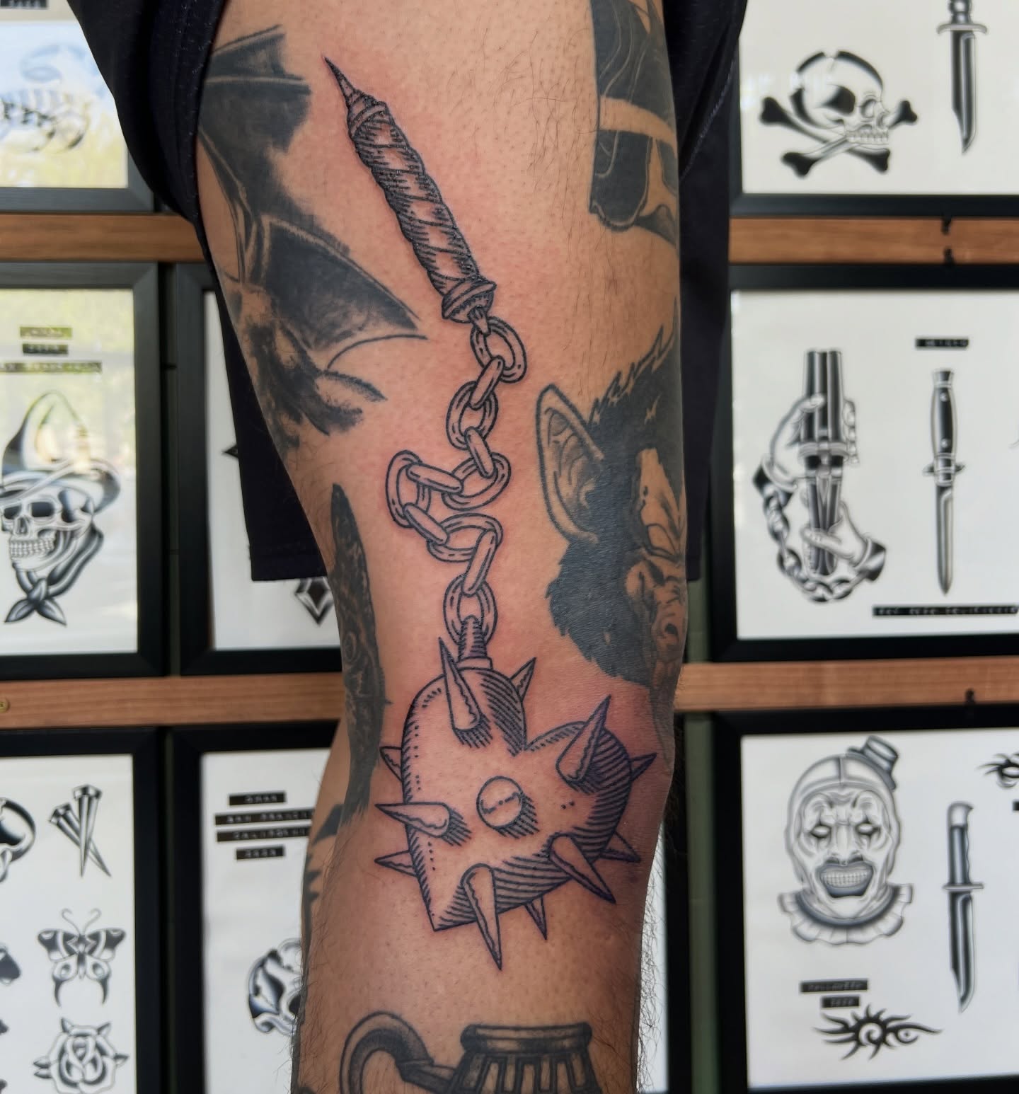 Chain and spiked ball black and grey tattoo on the forearm by @syrenbier, San Francisco, California