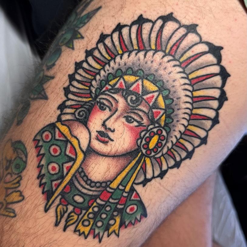 Indian dancer American traditional tattoo on the thigh by Larry Love