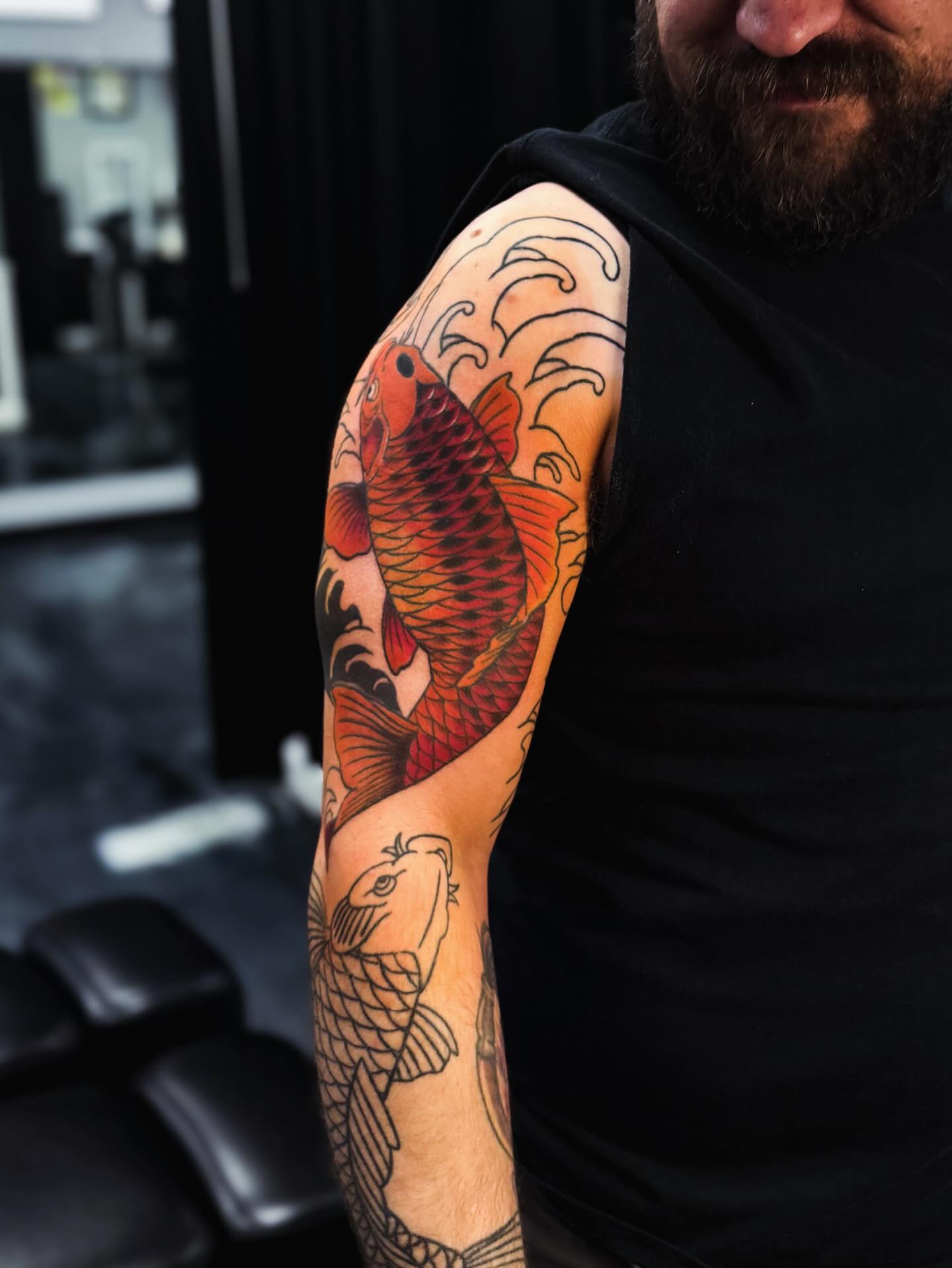 Koi fish japanese irezumi tattoo on the upper arm by Marie Amor🌙