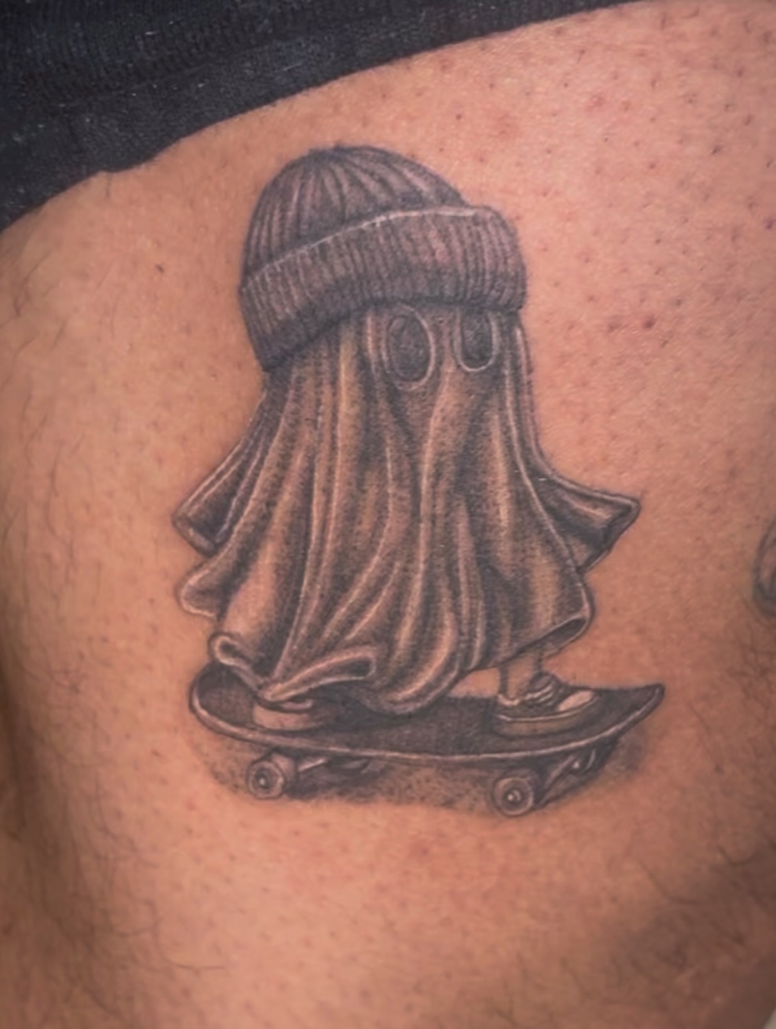 Skateboarding ghost realism tattoo on the thigh by 𝔾𝔥𝓸ş𝔱