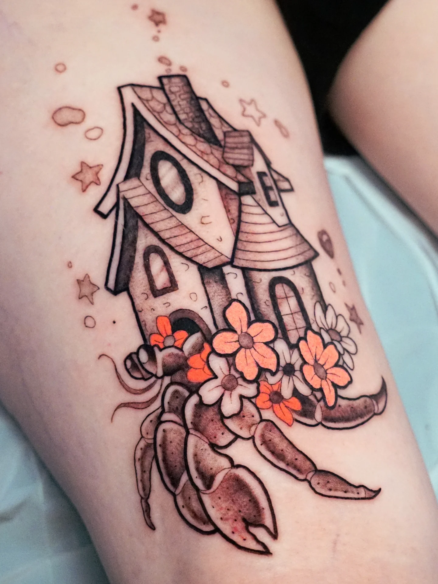 House with flowers American traditional tattoo on the thigh by kylie, San Antonio, Texas