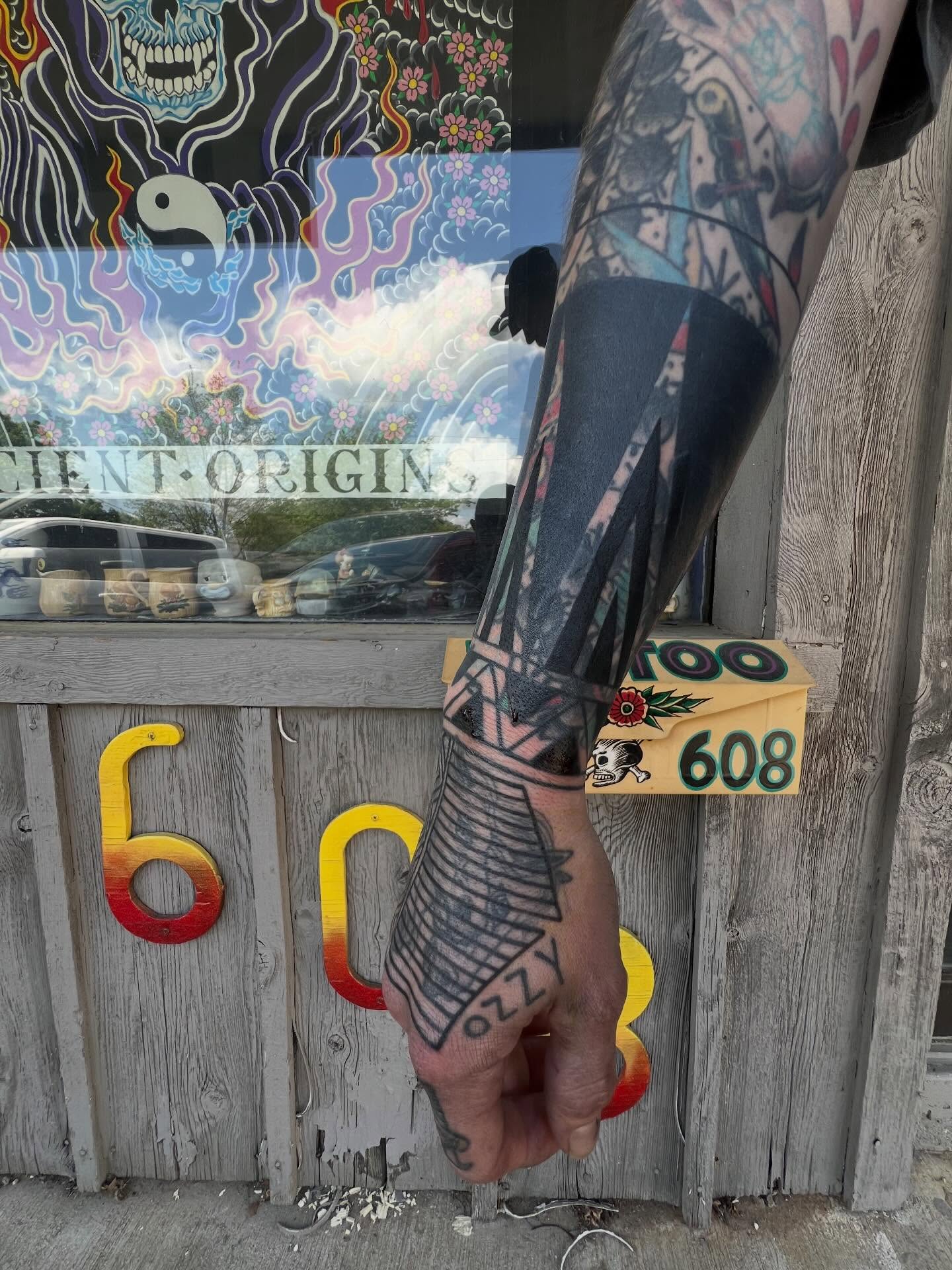Geometric pattern geometric tattoo on the forearm by Charlie Campanella