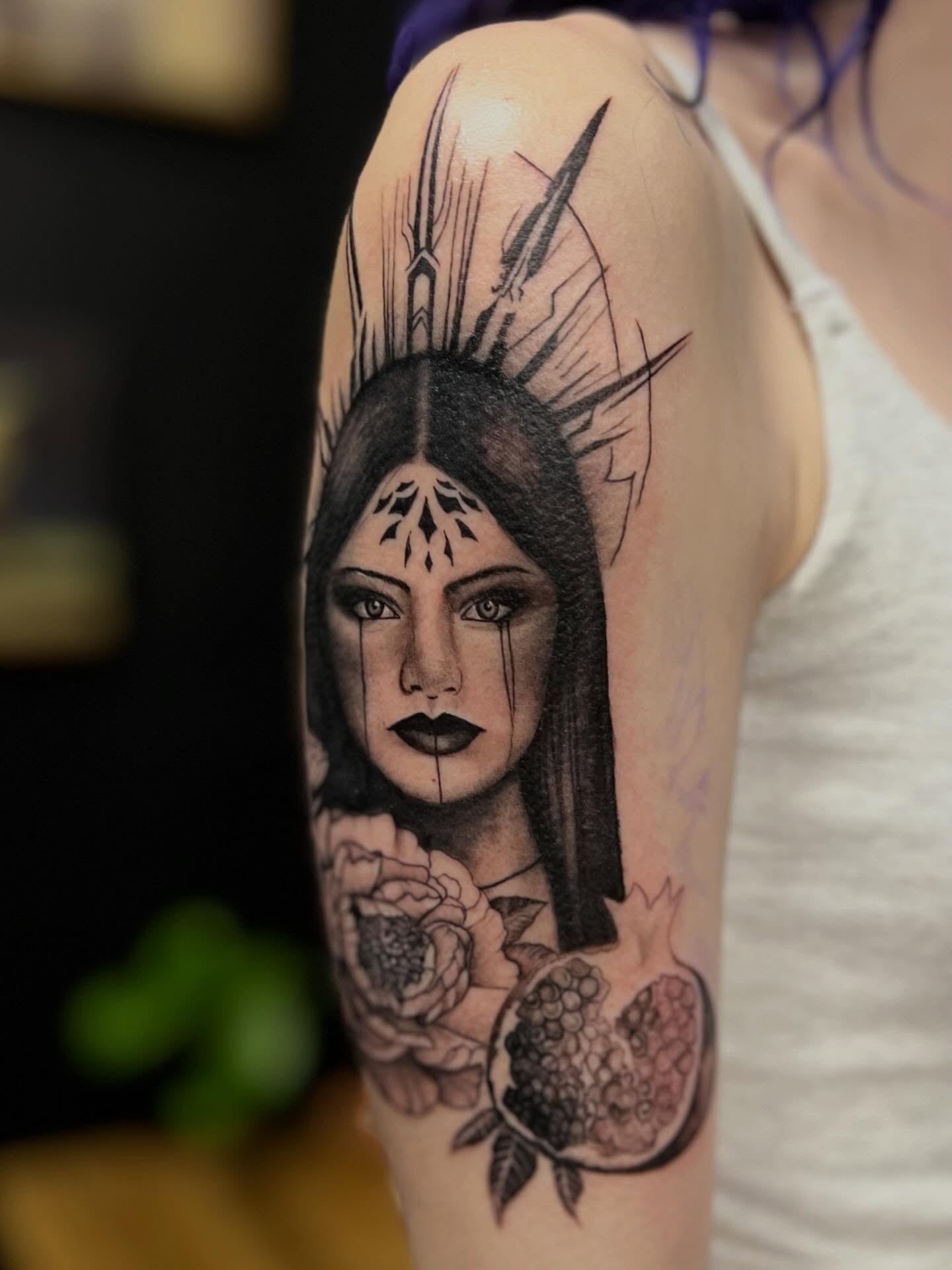 Woman with crown realism tattoo on the shoulder by Rebecca Kern Tattoos