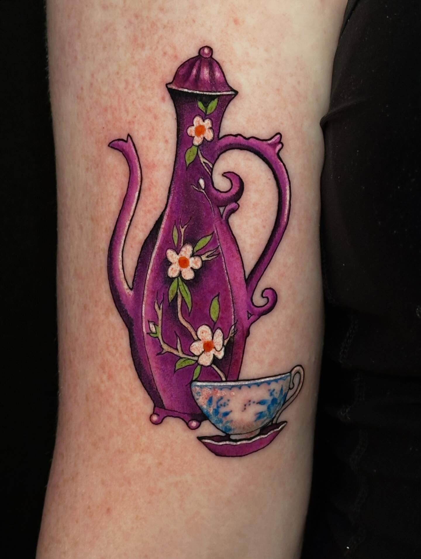 Purple teapot new school tattoo on the forearm by Liz McDonald