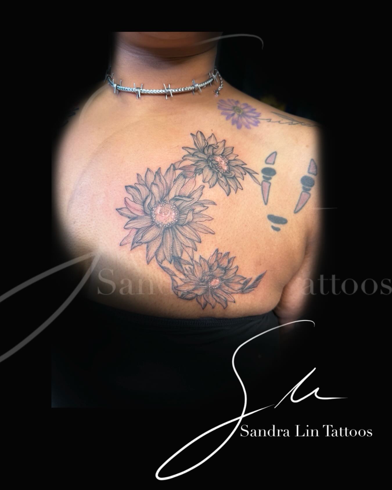Sunflowers black and grey tattoo on the chest by Sandra Lin Cue
