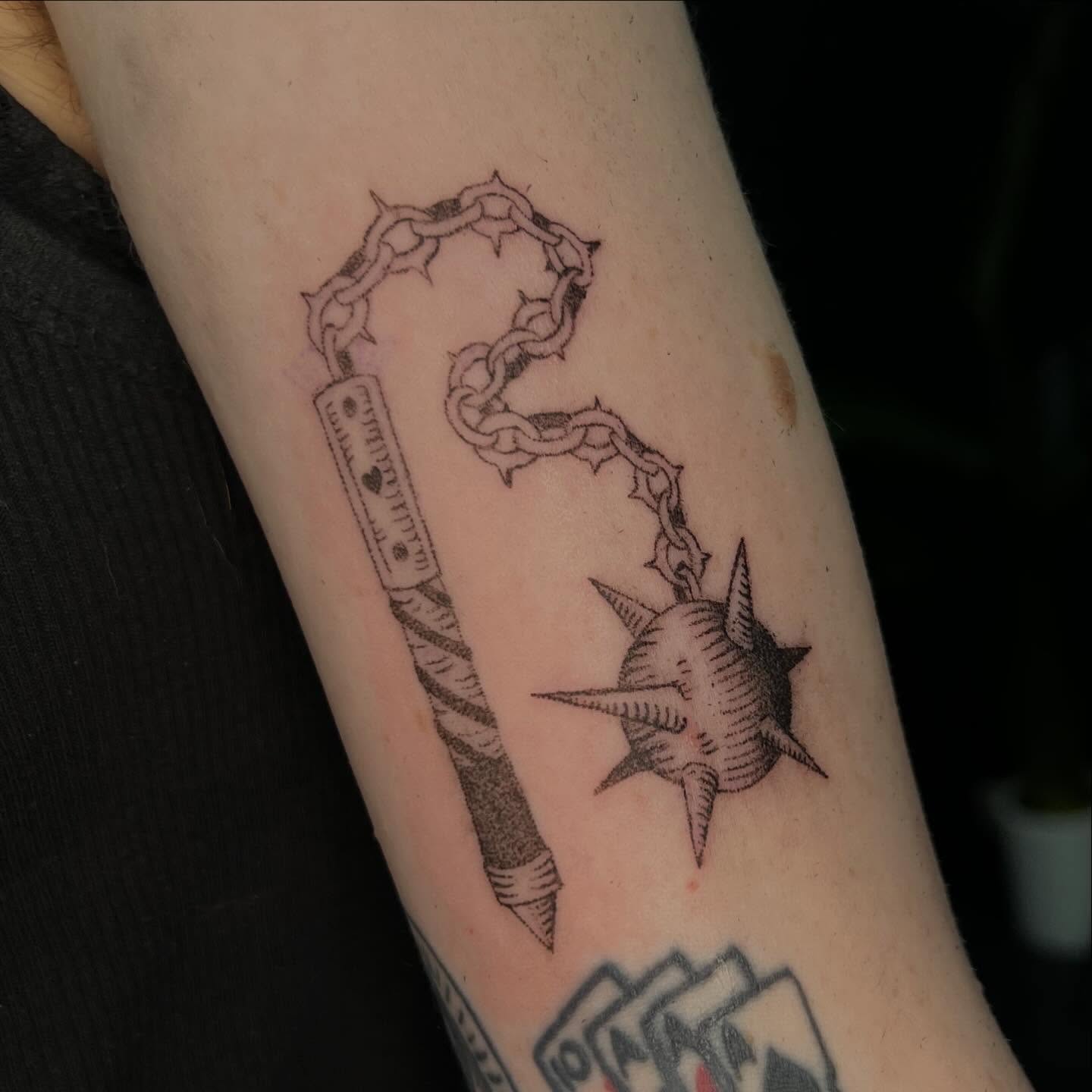 Pen and chain black and grey tattoo on the forearm by ⁎⁺˳✧༚Emma