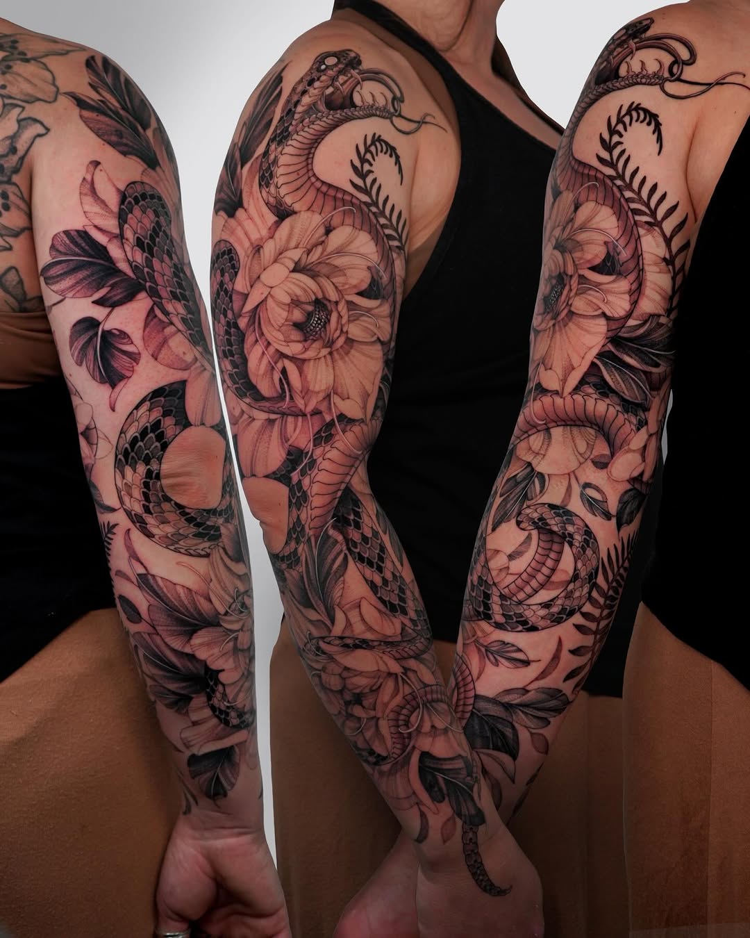 Snake and flowers Japanese tattoo on the upper arm by Drew Nelson