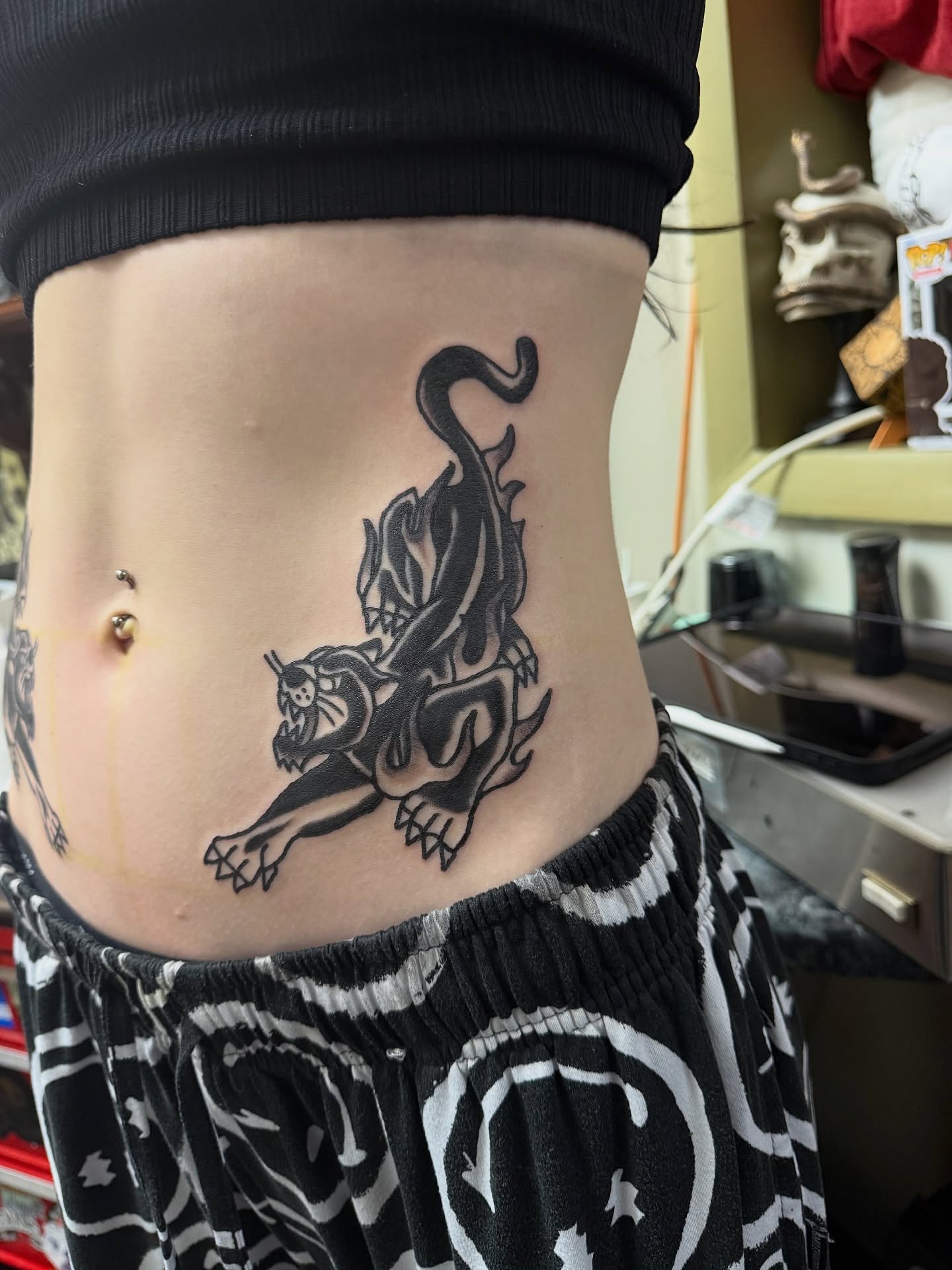 Panther black and grey tattoo on the torso by @kevingaretz, Jersey City, New Jersey