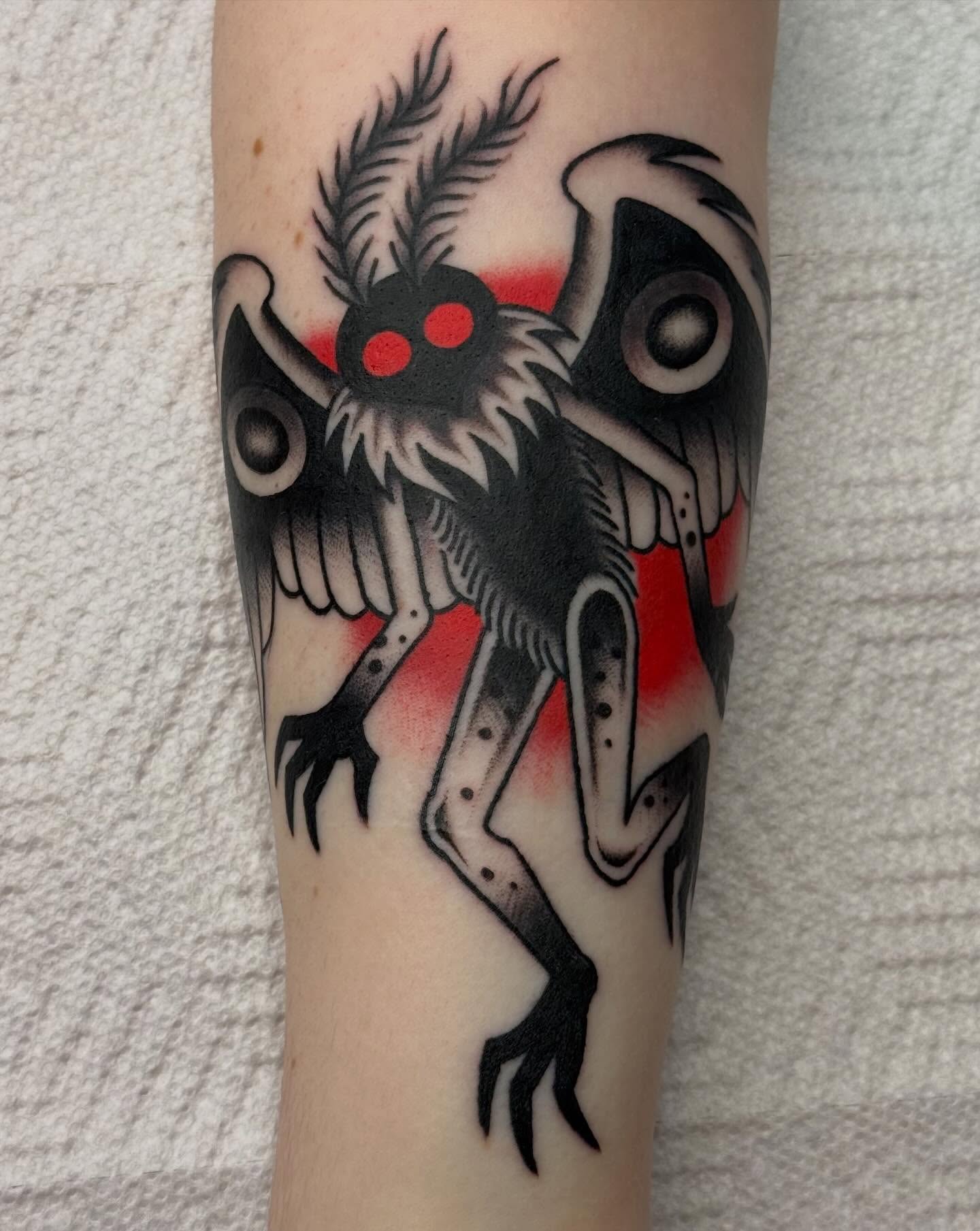 Bird-like creature American traditional tattoo on the forearm by Emma Eaton