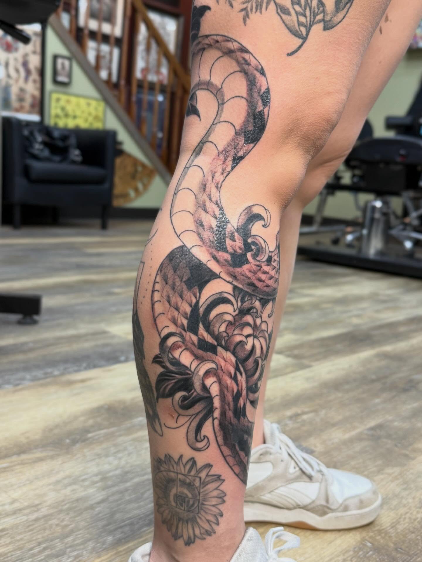 Dragon and wave japanese irezumi tattoo on the calf by Eli
