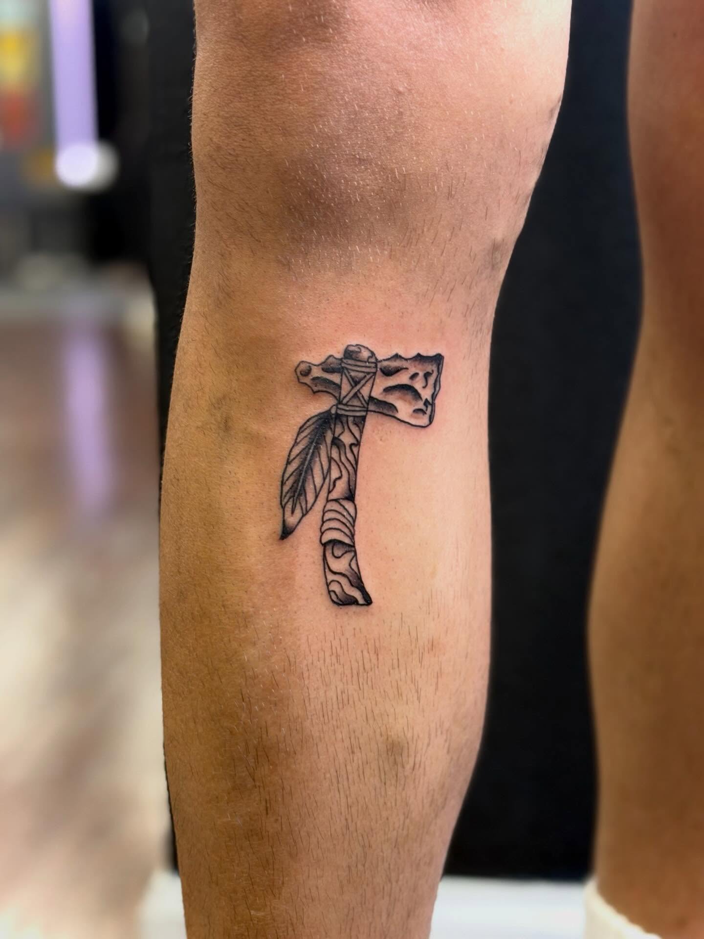 Cross with feather black and grey tattoo on the forearm by ♱ C ♱, Dallas, Texas