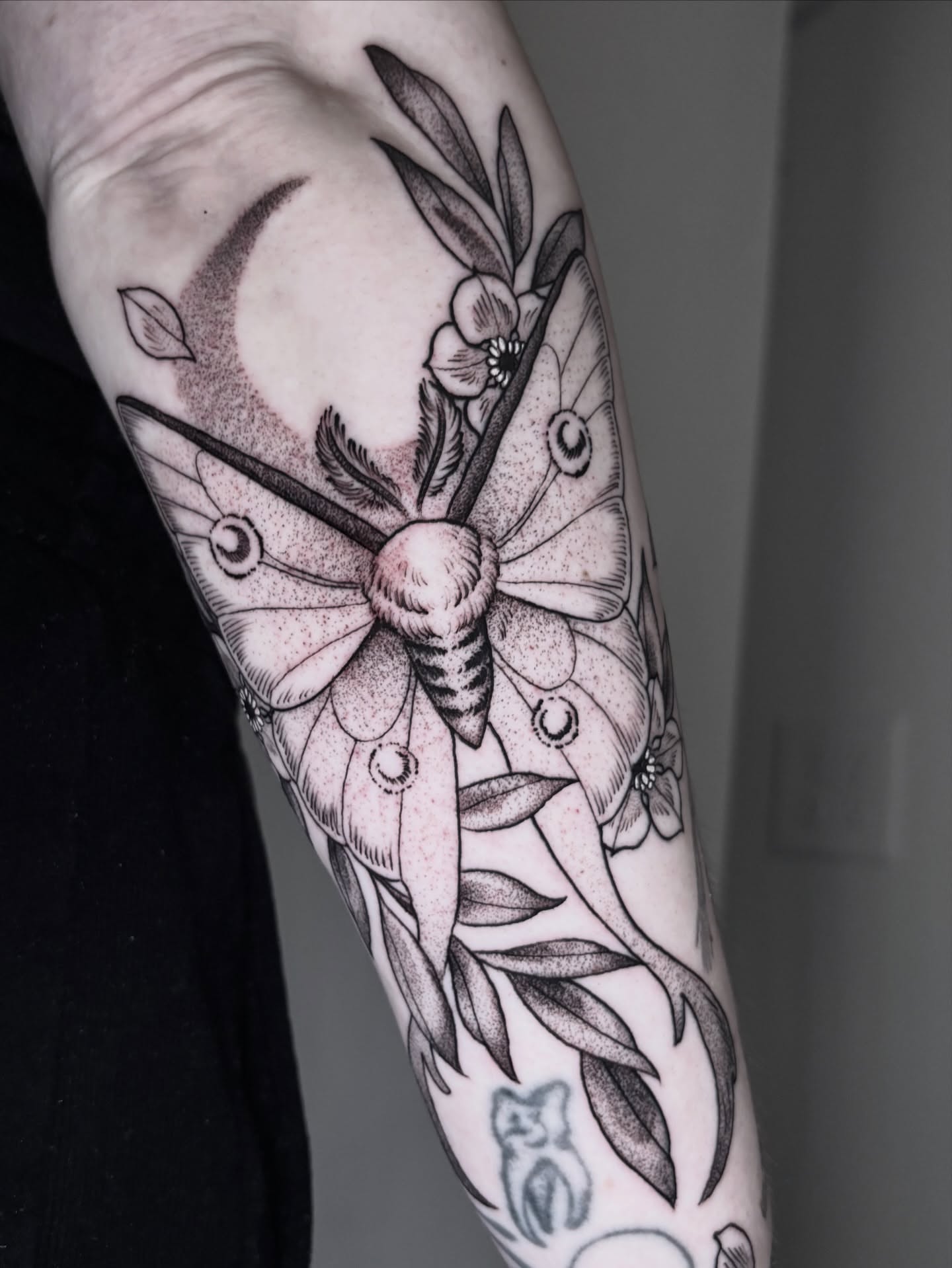 Moth and flowers realism tattoo on the forearm by π―πππππ