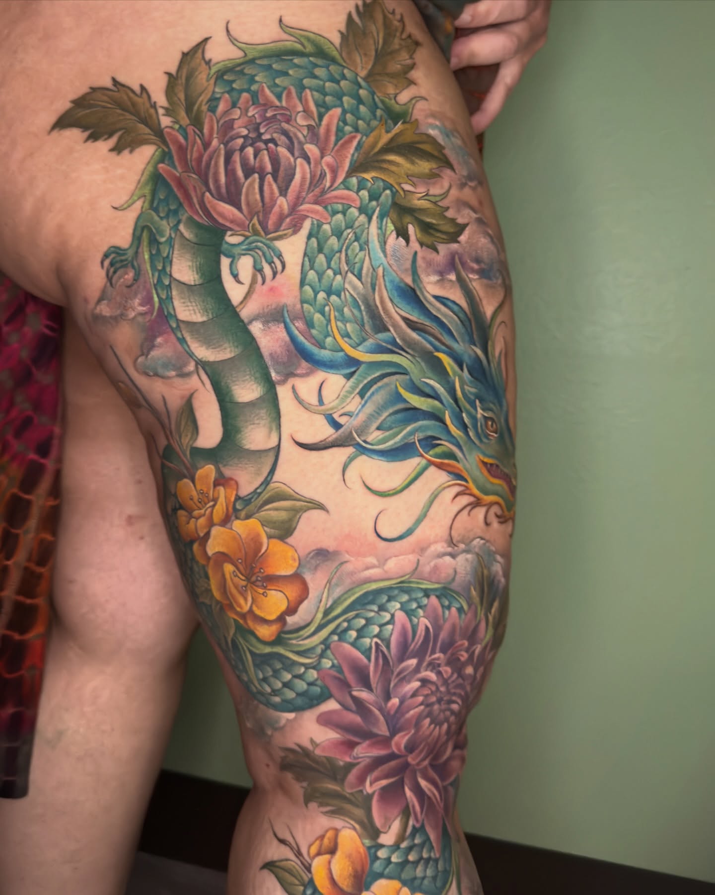 Dragon and flowers japanese irezumi tattoo on the thigh by Nichole Lorence