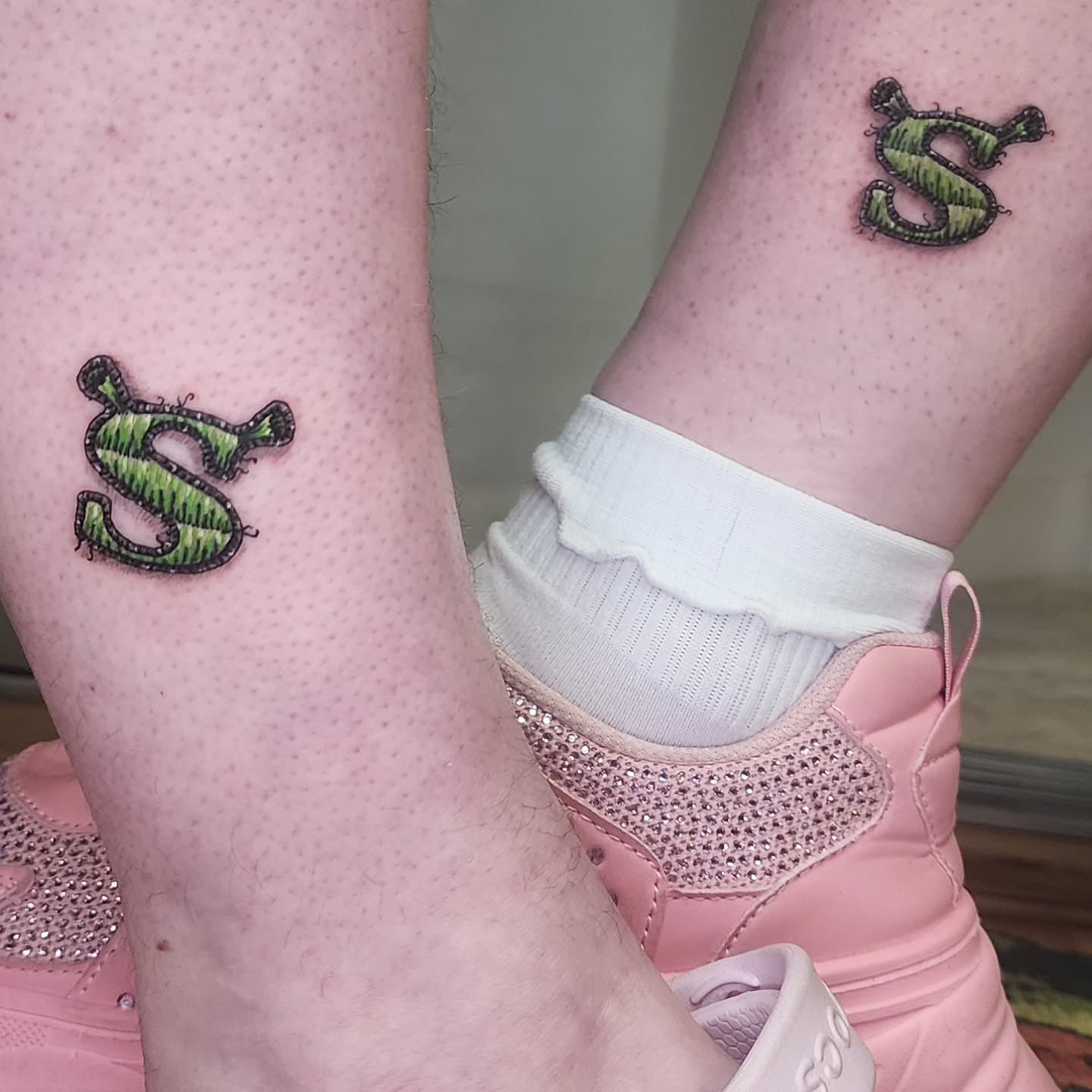 Dollar sign dotwork tattoo on the forearm by Lindsey Andrew, Englewood, Colorado