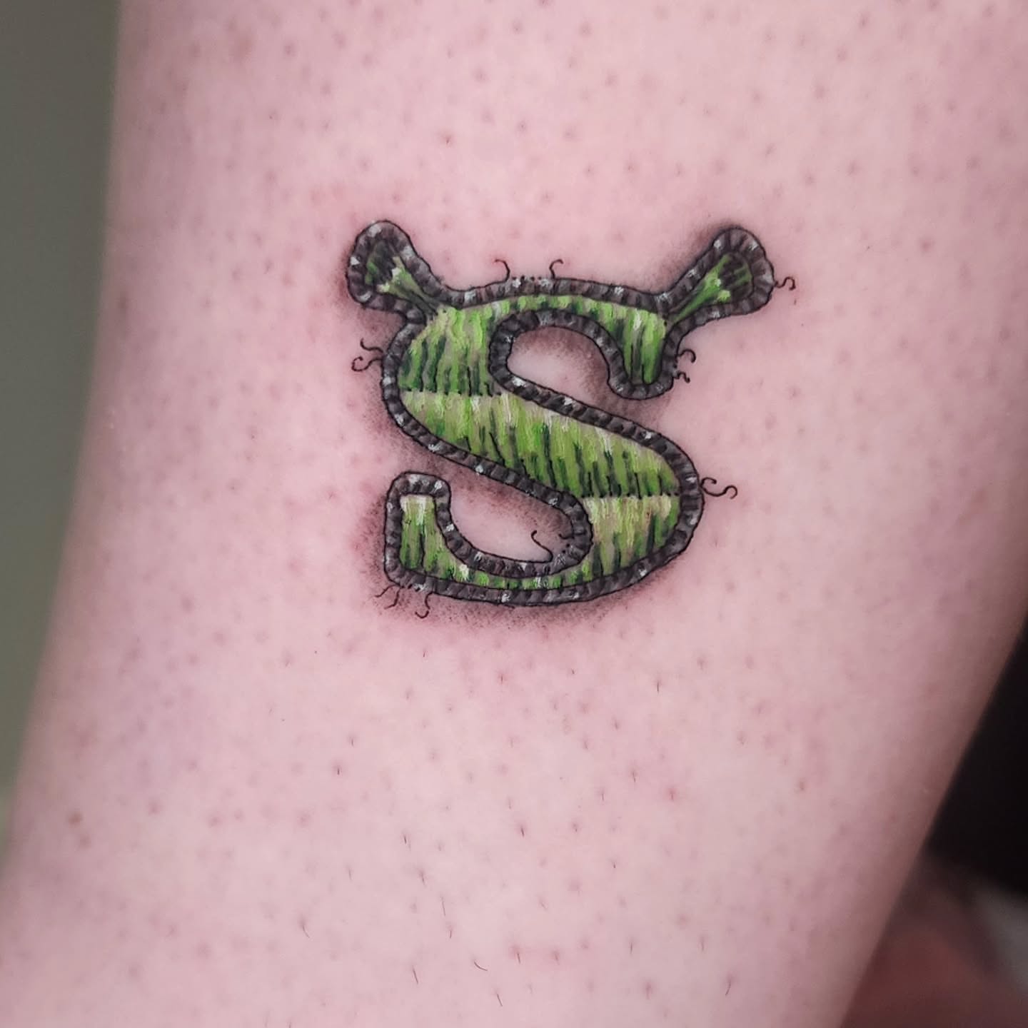 Letter S new school tattoo on the forearm by Lindsey Andrew, Englewood, Colorado