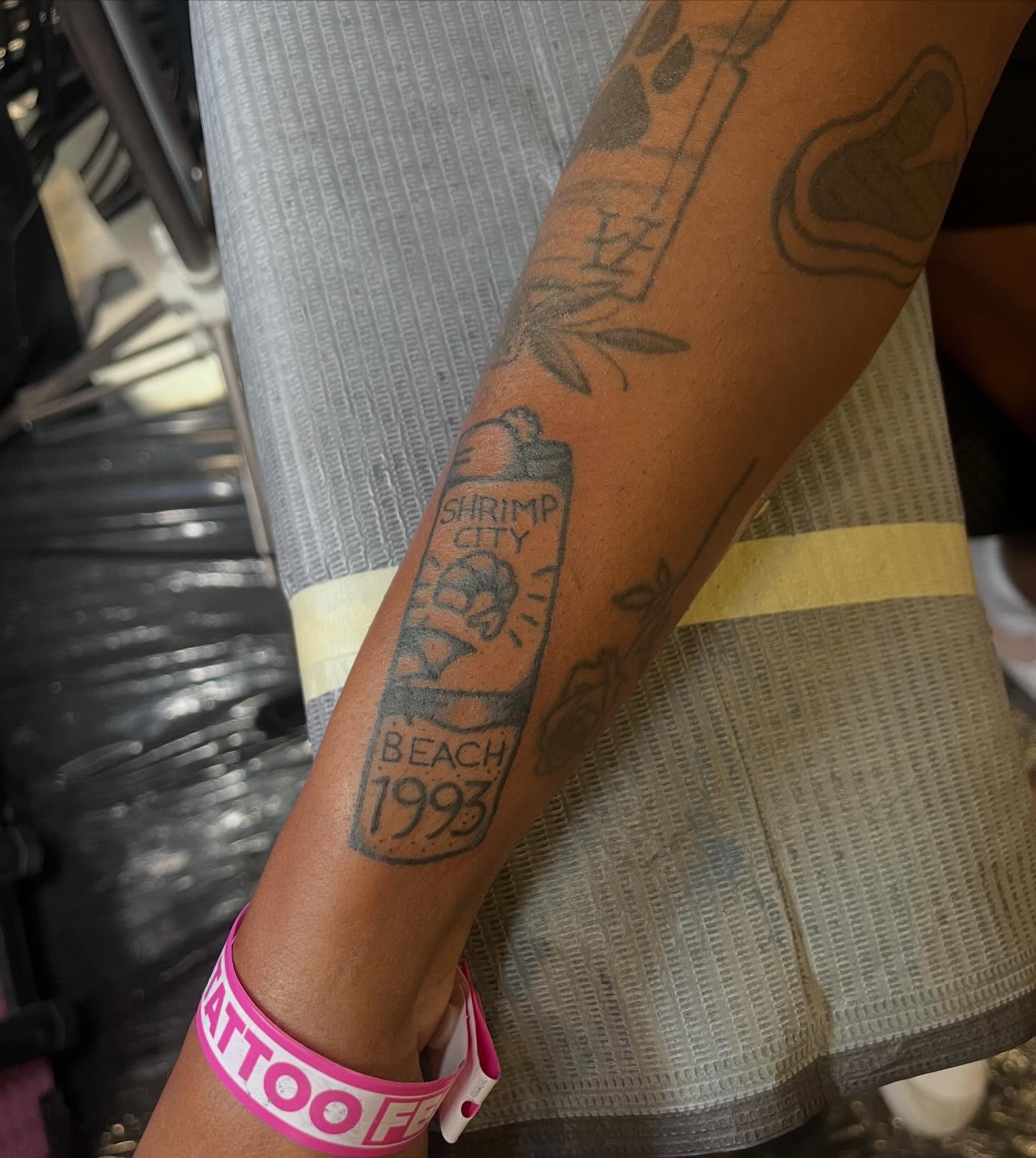 Beach bottle black and grey tattoo on the forearm by madelynne (maddie) caldwell tattoos