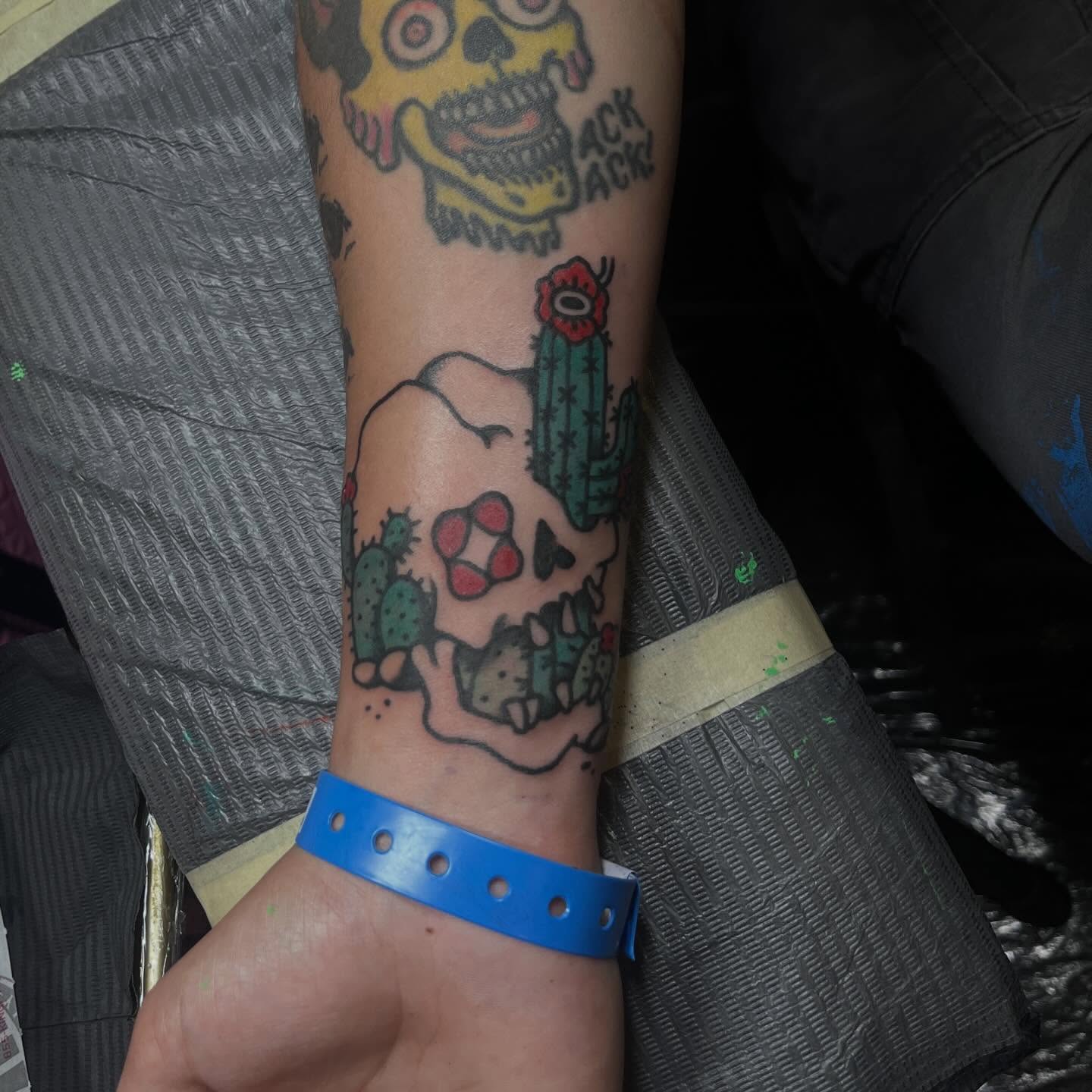 Cactus and skull American traditional tattoo on the forearm by madelynne (maddie) caldwell tattoos