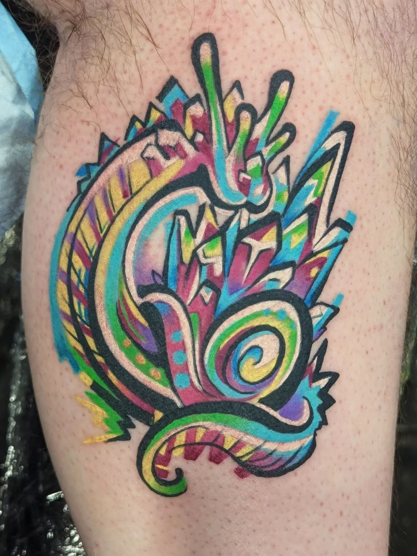 Abstract design new school tattoo on the thigh by Devon Greig