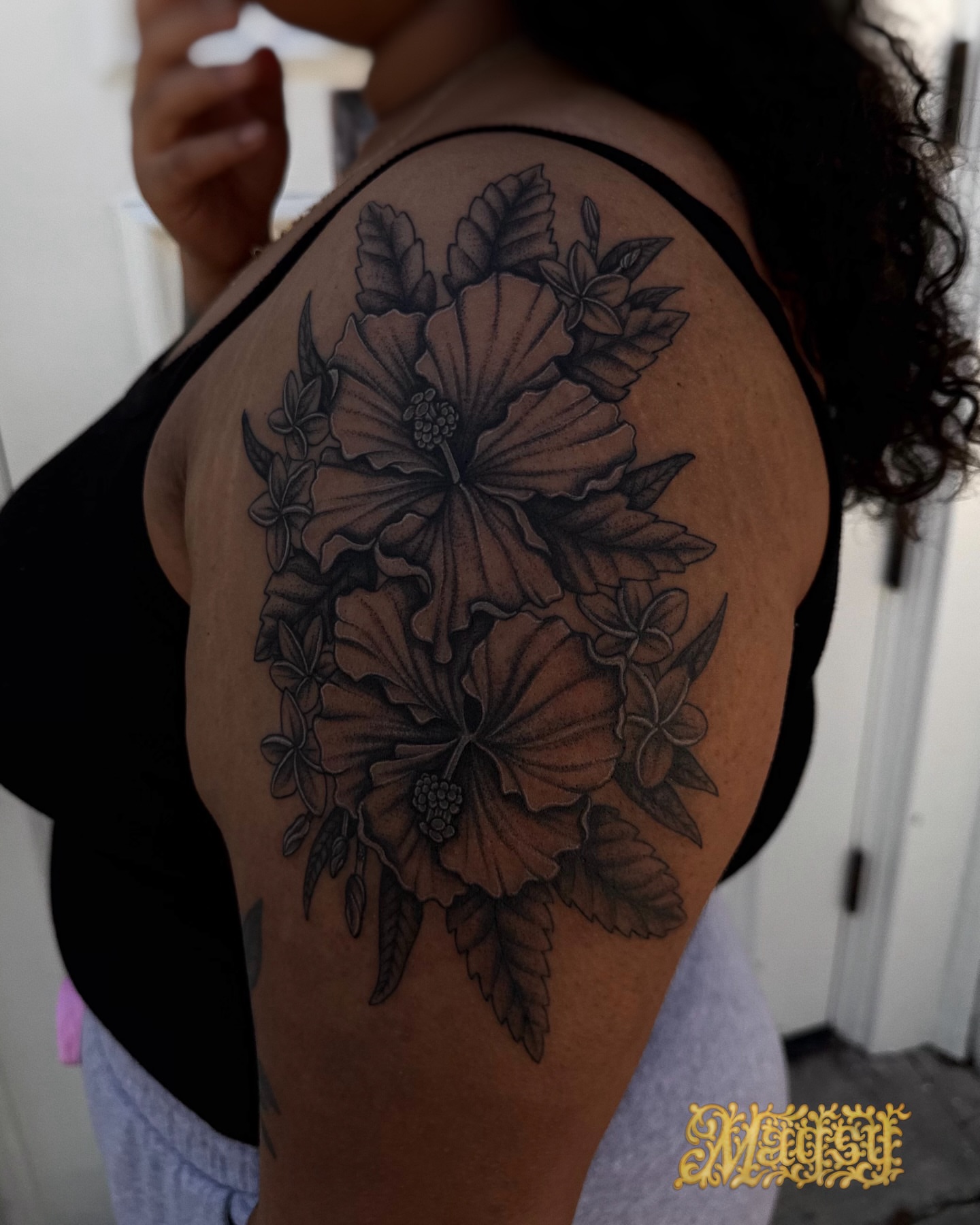 Hibiscus flowers black and grey tattoo on the shoulder by Magsy, Orange, California