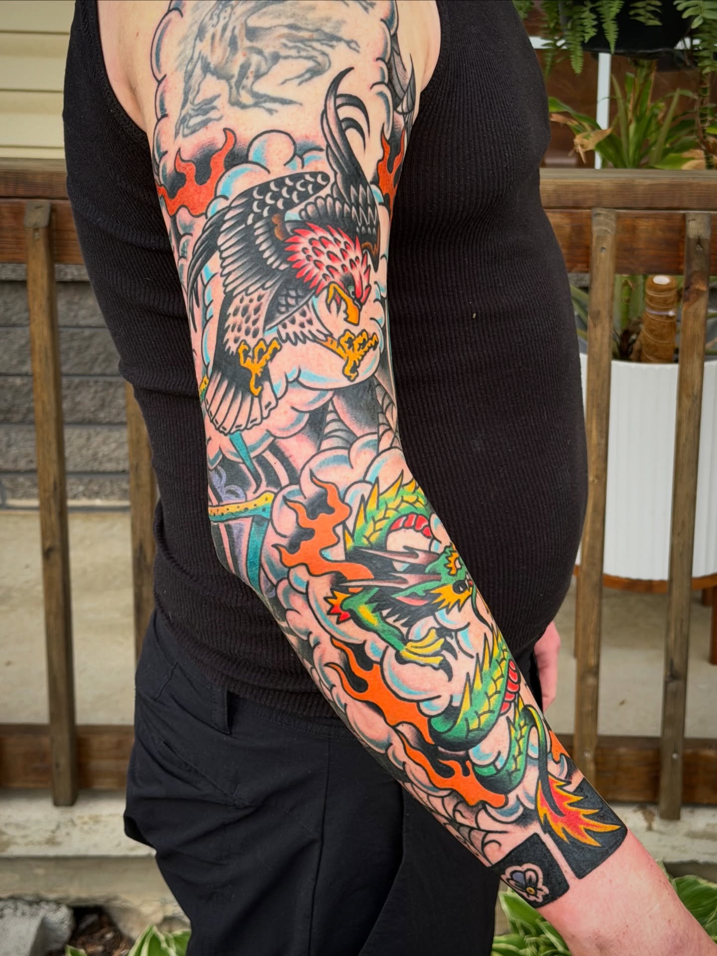 Dragon and phoenix American traditional tattoo on the upper arm by 🌈KNOXVILLE’S FAVORITE TATTOO ARTIST 👽 마법 버섯