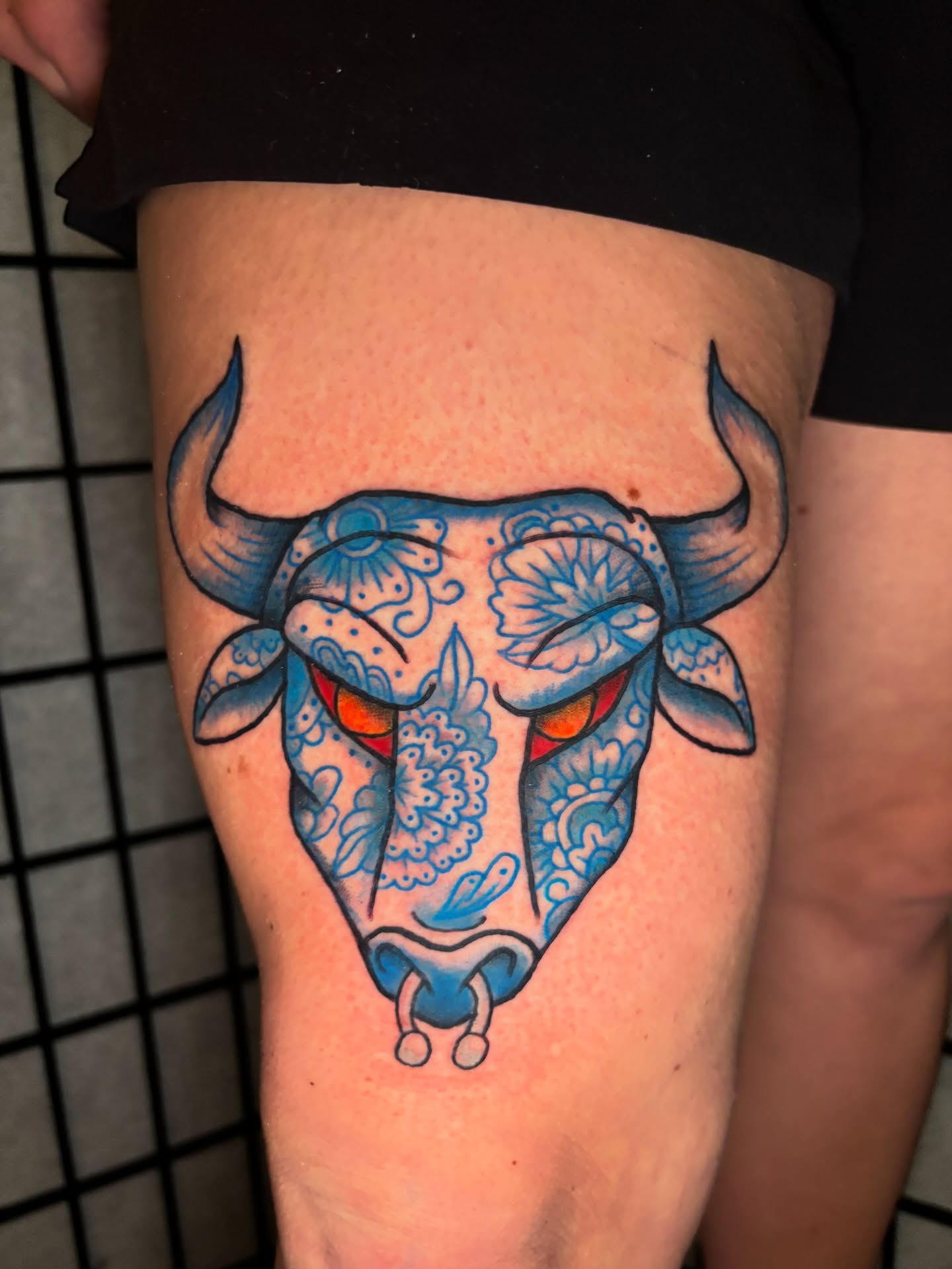 Bull skull dotwork tattoo on the thigh by Lilly Evans