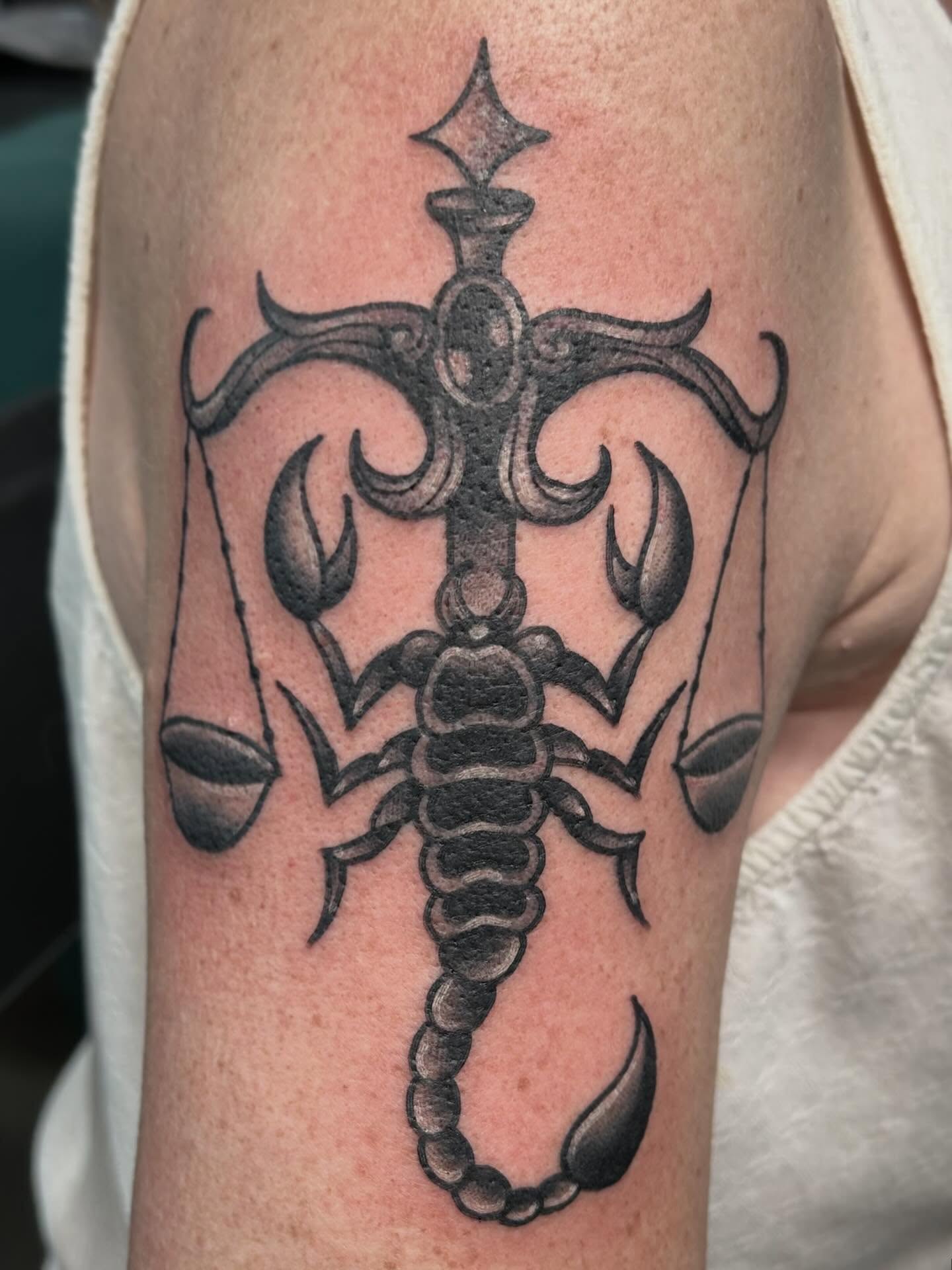 Scorpion and scales black and grey tattoo on the forearm by Morgan Hazer Tattoos, Cedar Rapids, Iowa