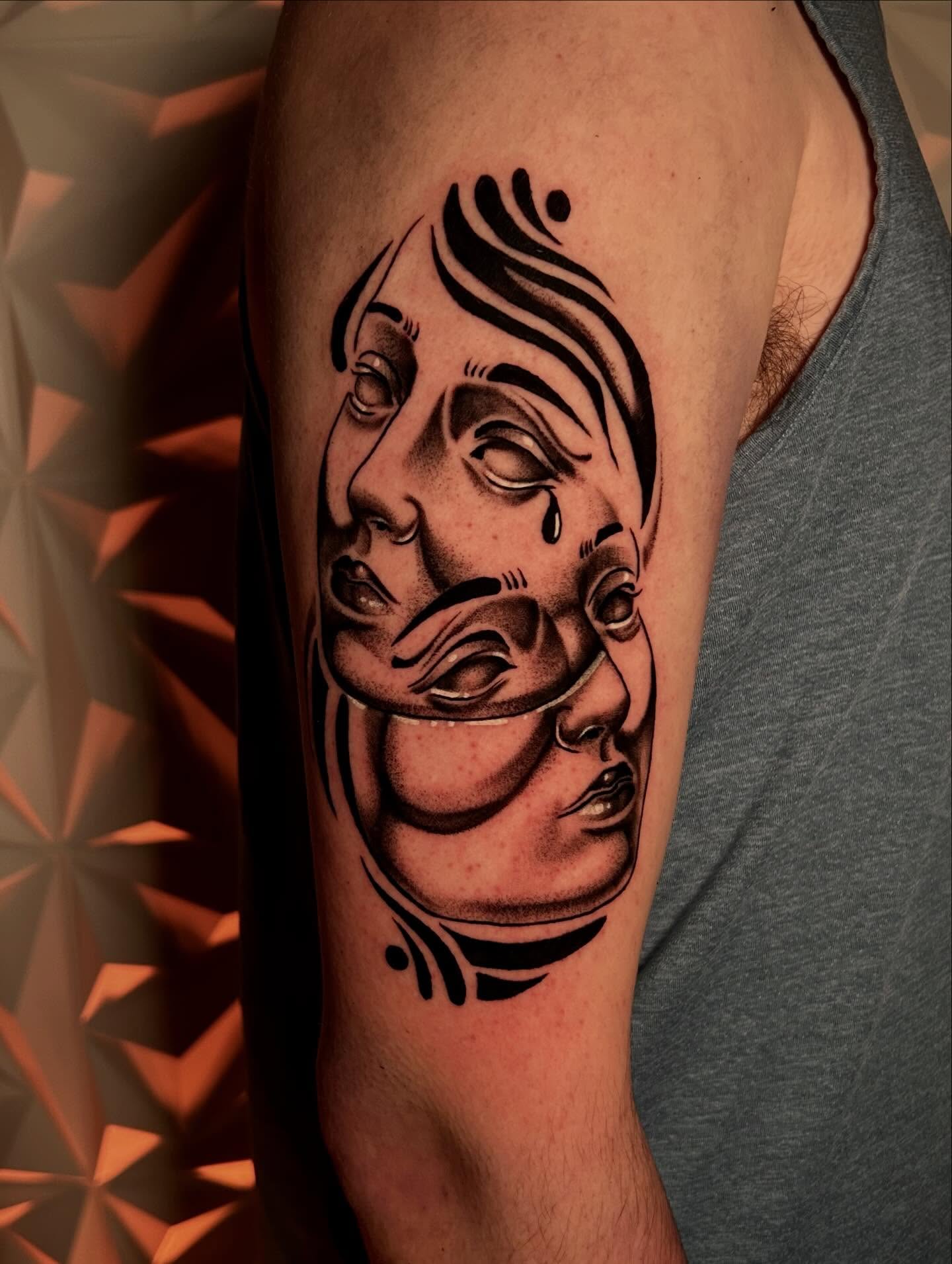 Abstract faces realism tattoo on the forearm by Haleigh Cunningham, Charlotte, North Carolina